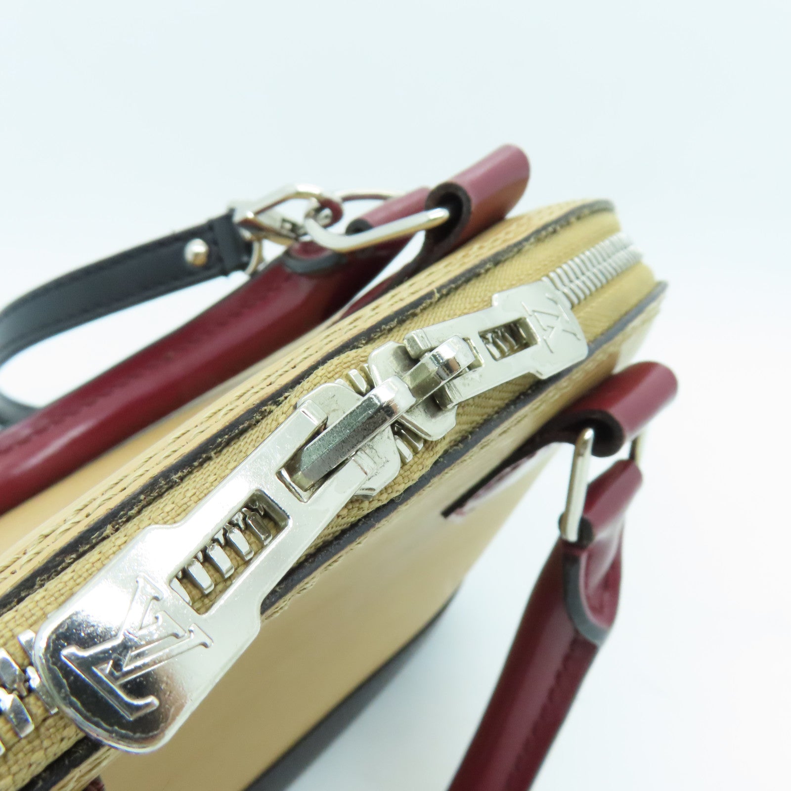 LOUIS VUITTON Epi Alma BB銀扣肩背袋棕色