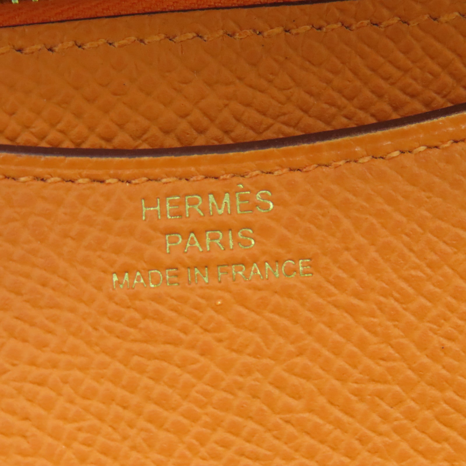 HERMES Epsom皮革Constance Silm金扣錢包橙色