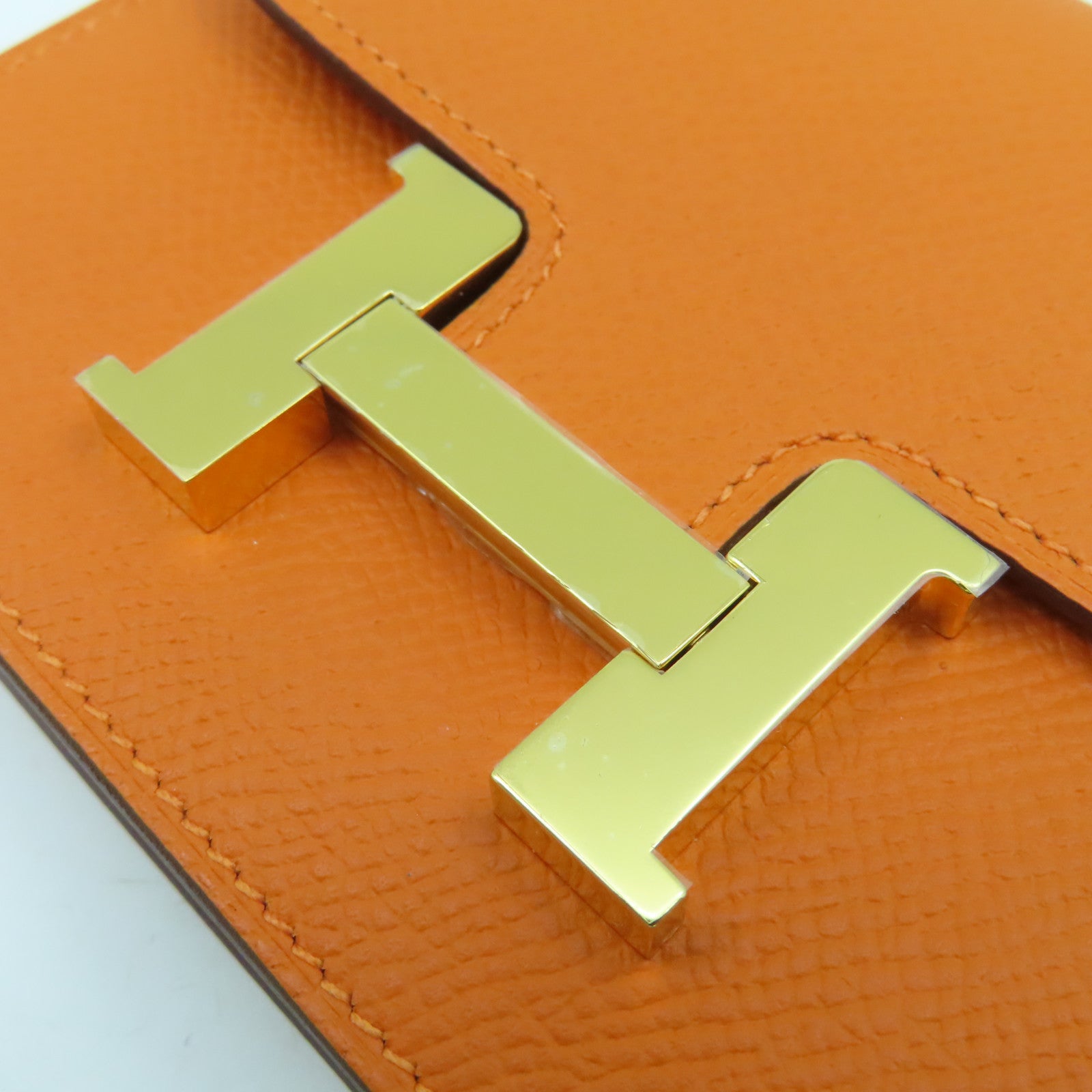 HERMES Epsom皮革Constance Silm金扣錢包橙色