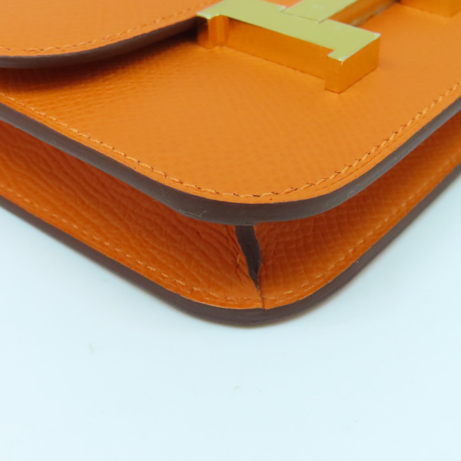 HERMES Epsom皮革Constance Silm金扣錢包橙色