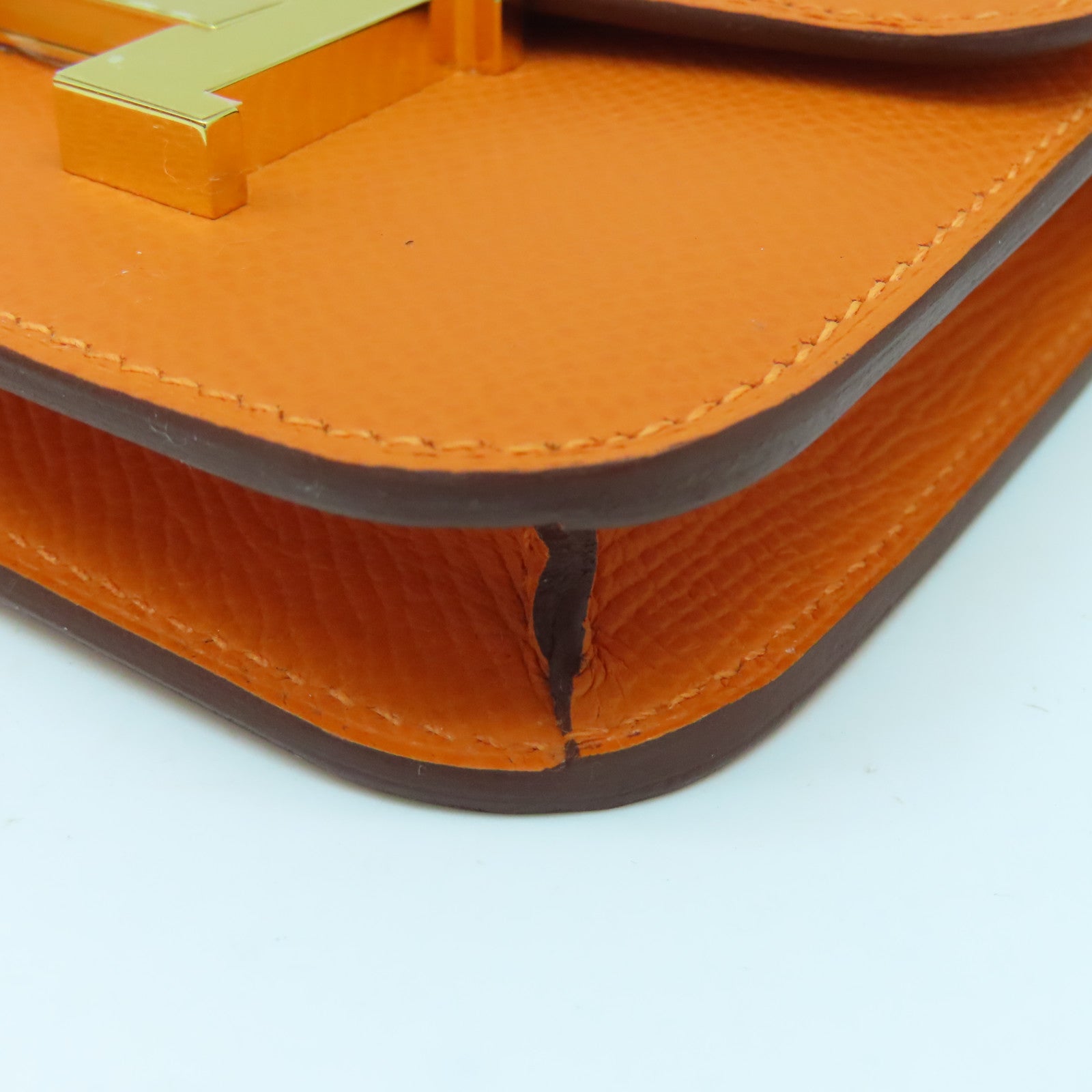HERMES Epsom皮革Constance Silm金扣錢包橙色