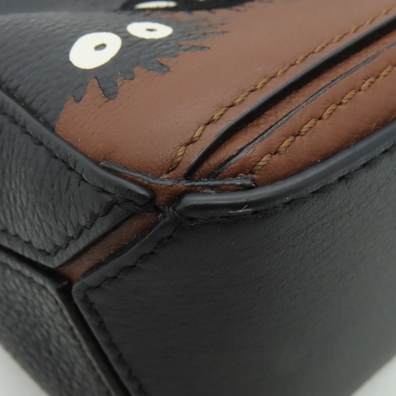 LOEWE 牛皮皮革Susuwatari Mini Puzzle Bag金扣手挽肩背兩用袋啡色/黑色