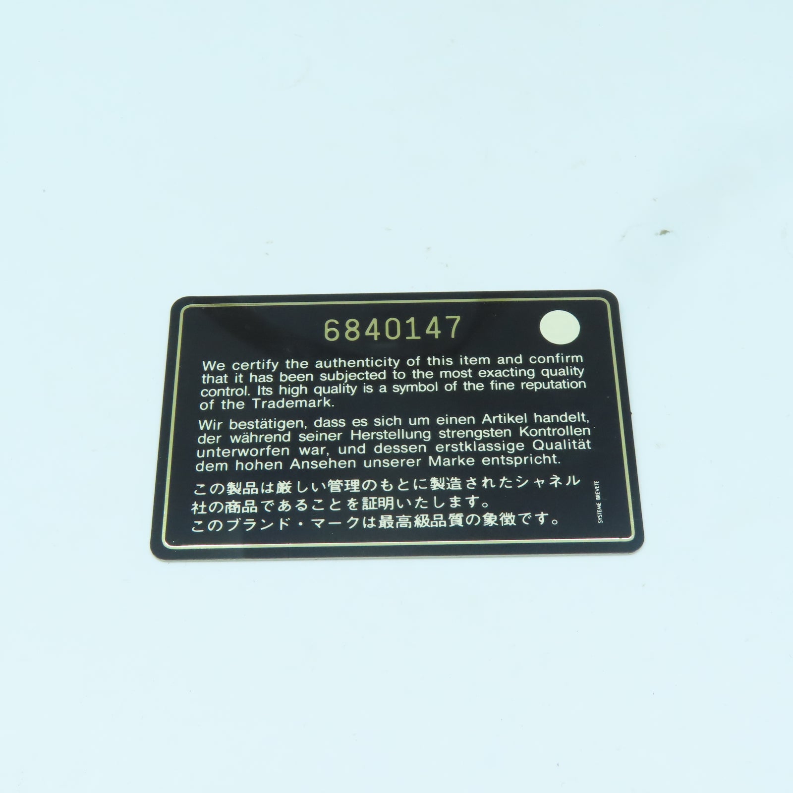 CHANEL 【激減優惠】尼龍New Travel Line銀扣手挽袋米色