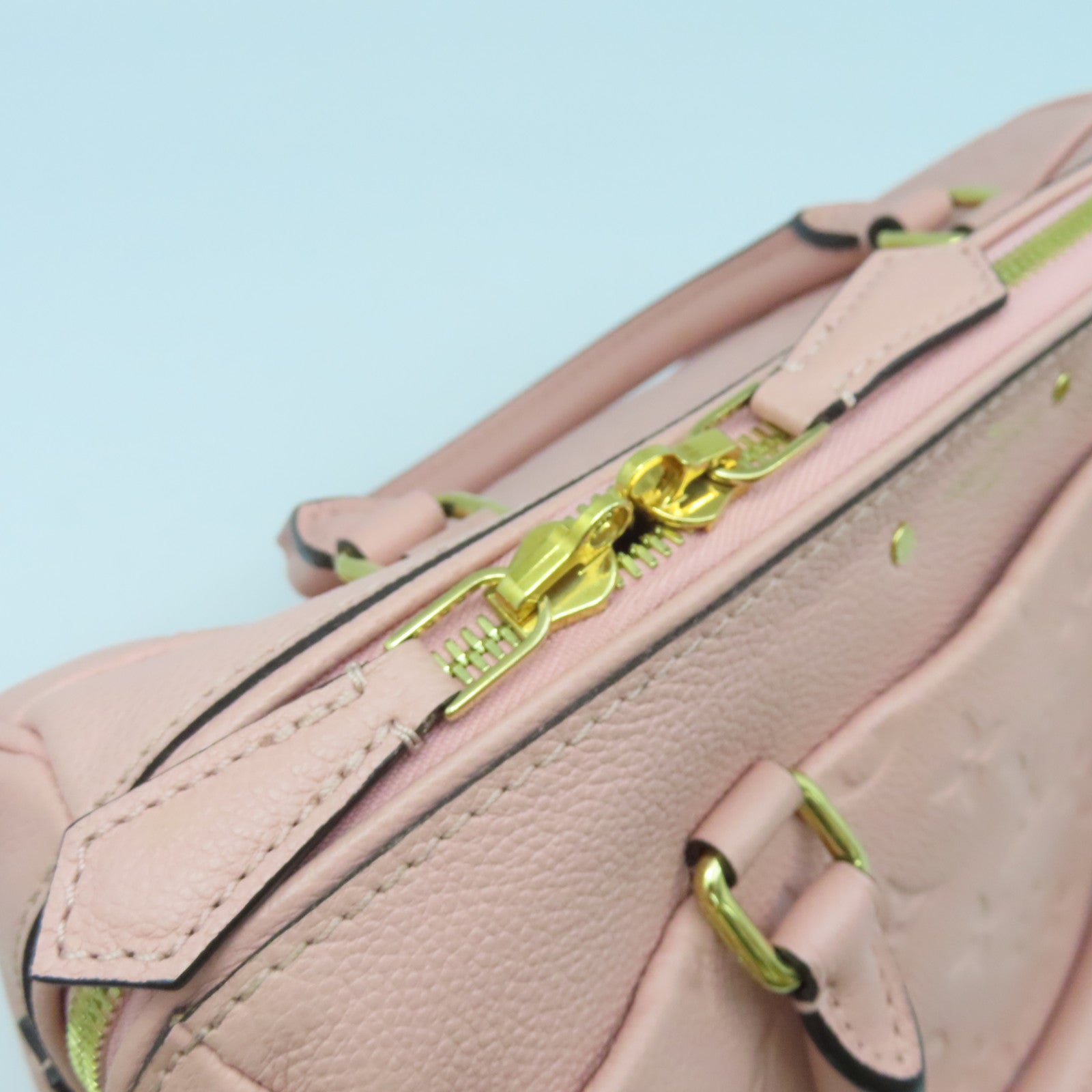 LOUIS VUITTON Monogram Empreinte Speedy Bandouliere 25金扣手挽肩背兩用袋粉紅色