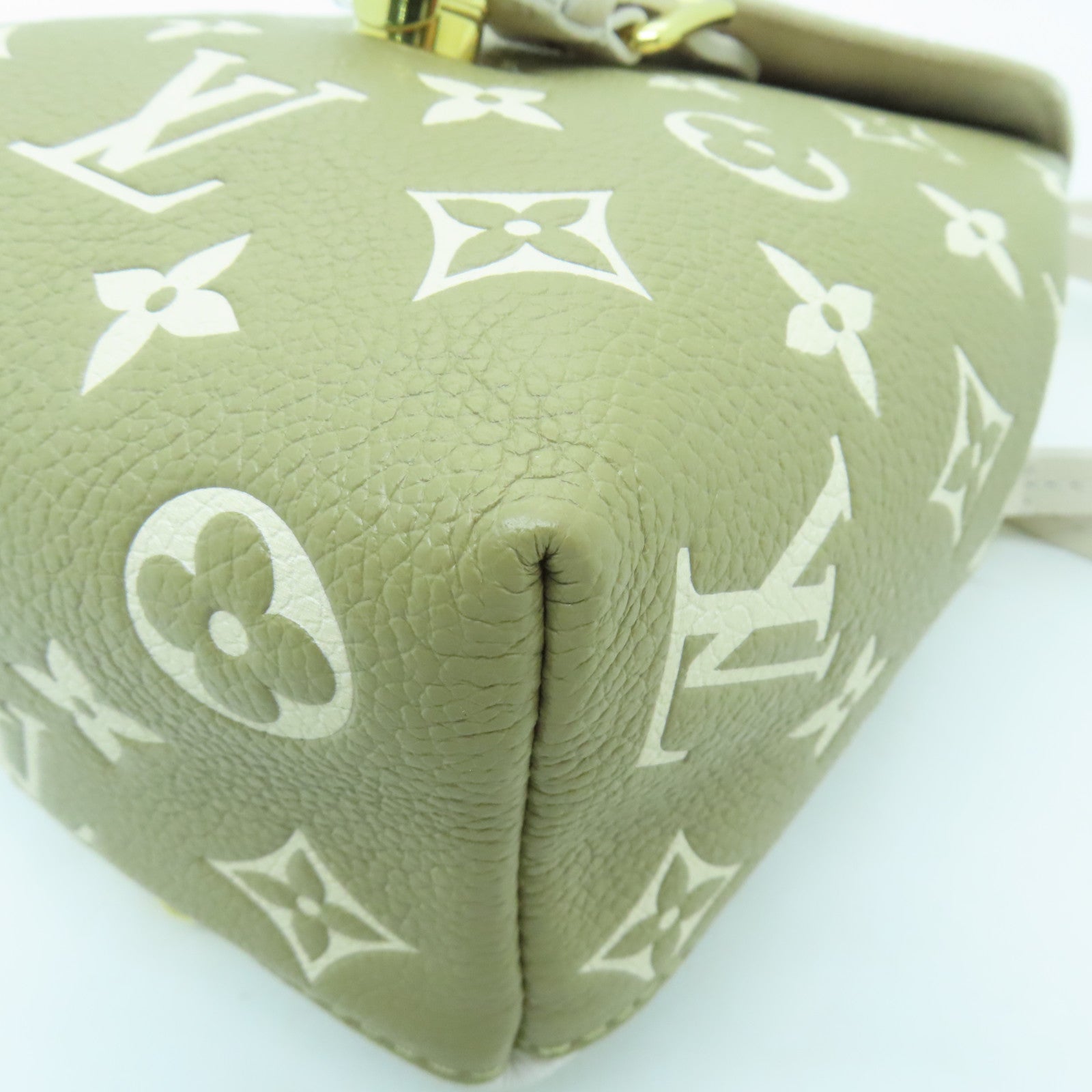 LOUIS VUITTON Monogram Empreinte Tiny Backpack金扣背包/肩背袋米色/綠色