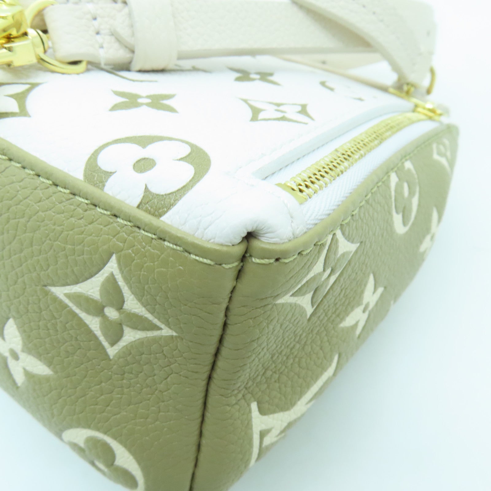 LOUIS VUITTON Monogram Empreinte Tiny Backpack金扣背包/肩背袋米色/綠色
