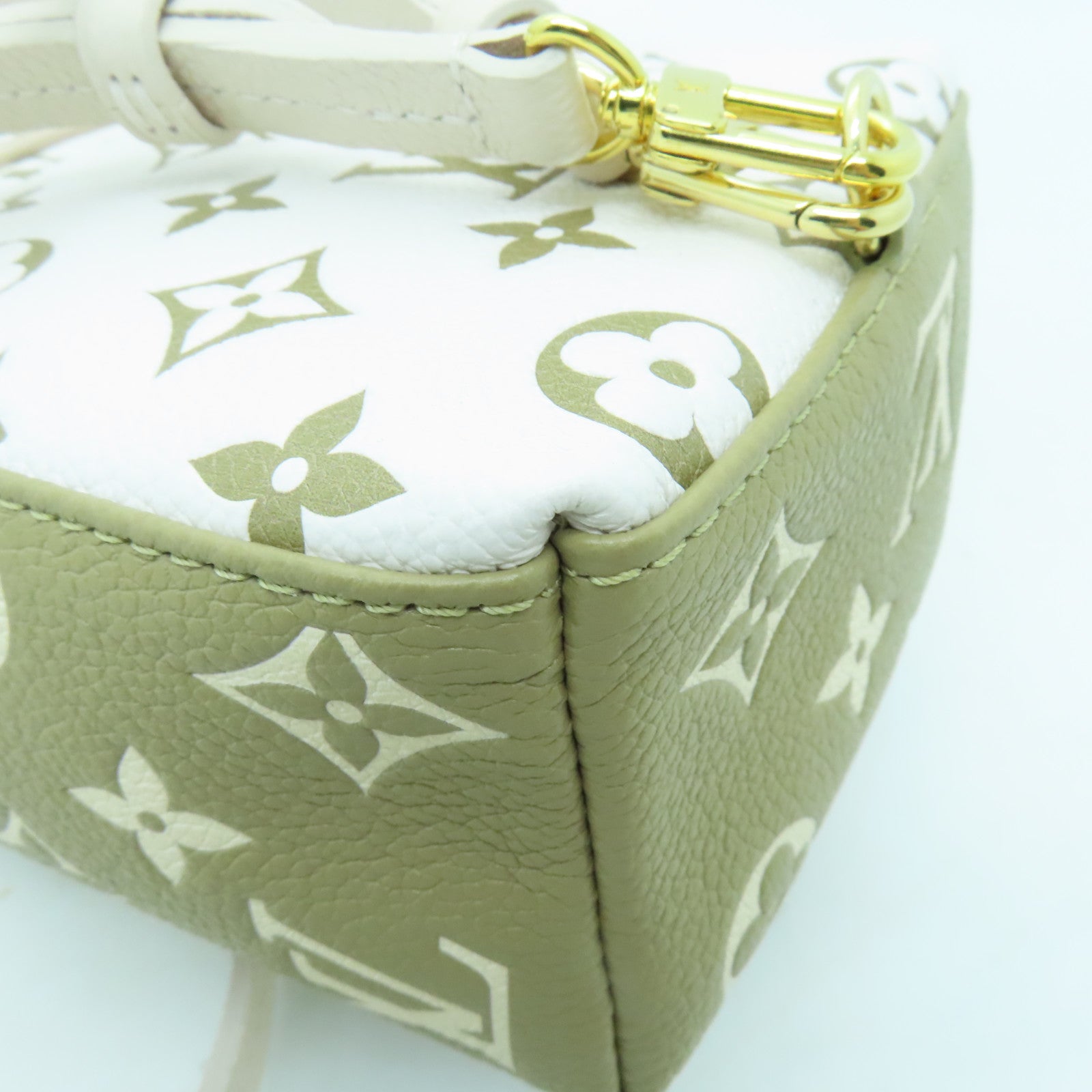 LOUIS VUITTON Monogram Empreinte Tiny Backpack金扣背包/肩背袋米色/綠色