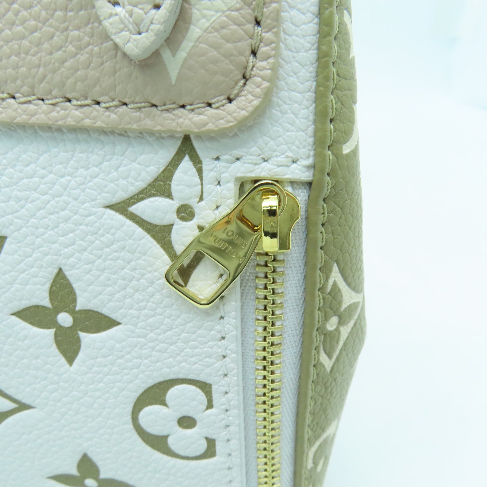 LOUIS VUITTON Monogram Empreinte Tiny Backpack金扣背包/肩背袋米色/綠色