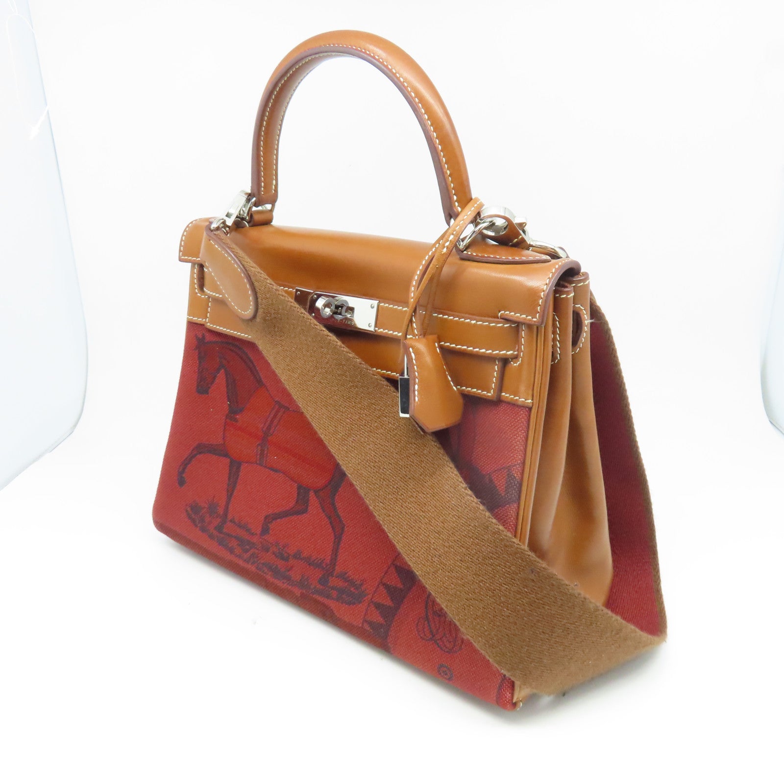 HERMES Canvas Retourne帆布/牛皮皮革Kelly 28 Limited Edition Of Horse銀扣手挽肩背兩用袋紅色/棕色