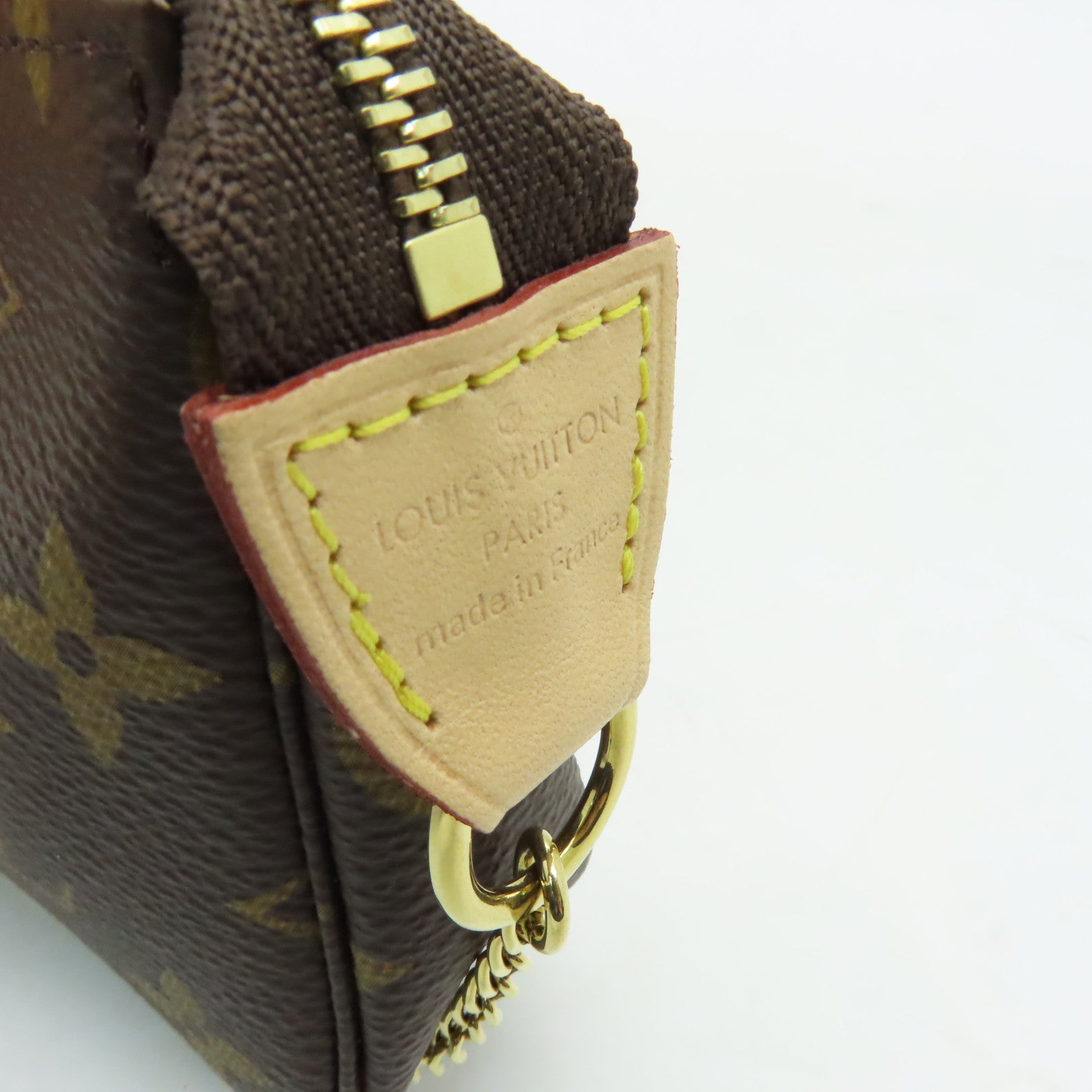 LOUIS VUITTON Monogram Mini Pochette Accessoires金扣手挽袋啡色
