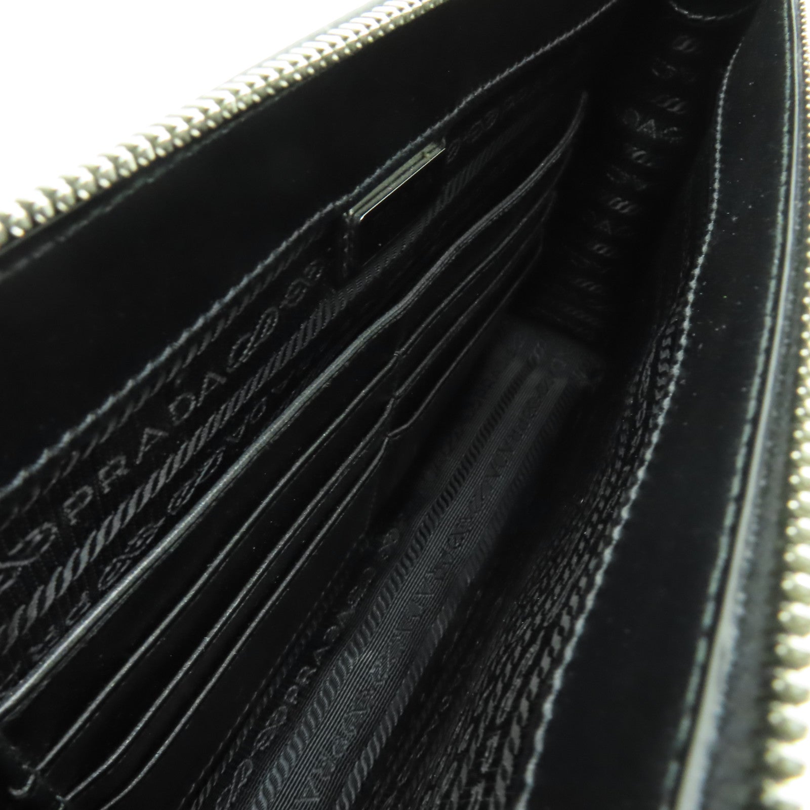 PRADA 牛皮皮革Clutch Bag銀扣手拿包黑色