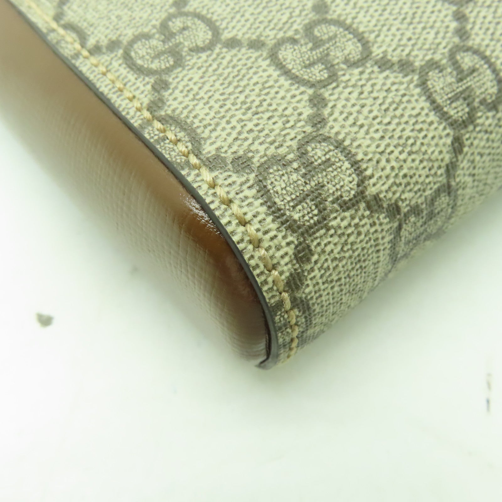 GUCCI 塗層帆布GG Supreme金扣肩背袋啡色