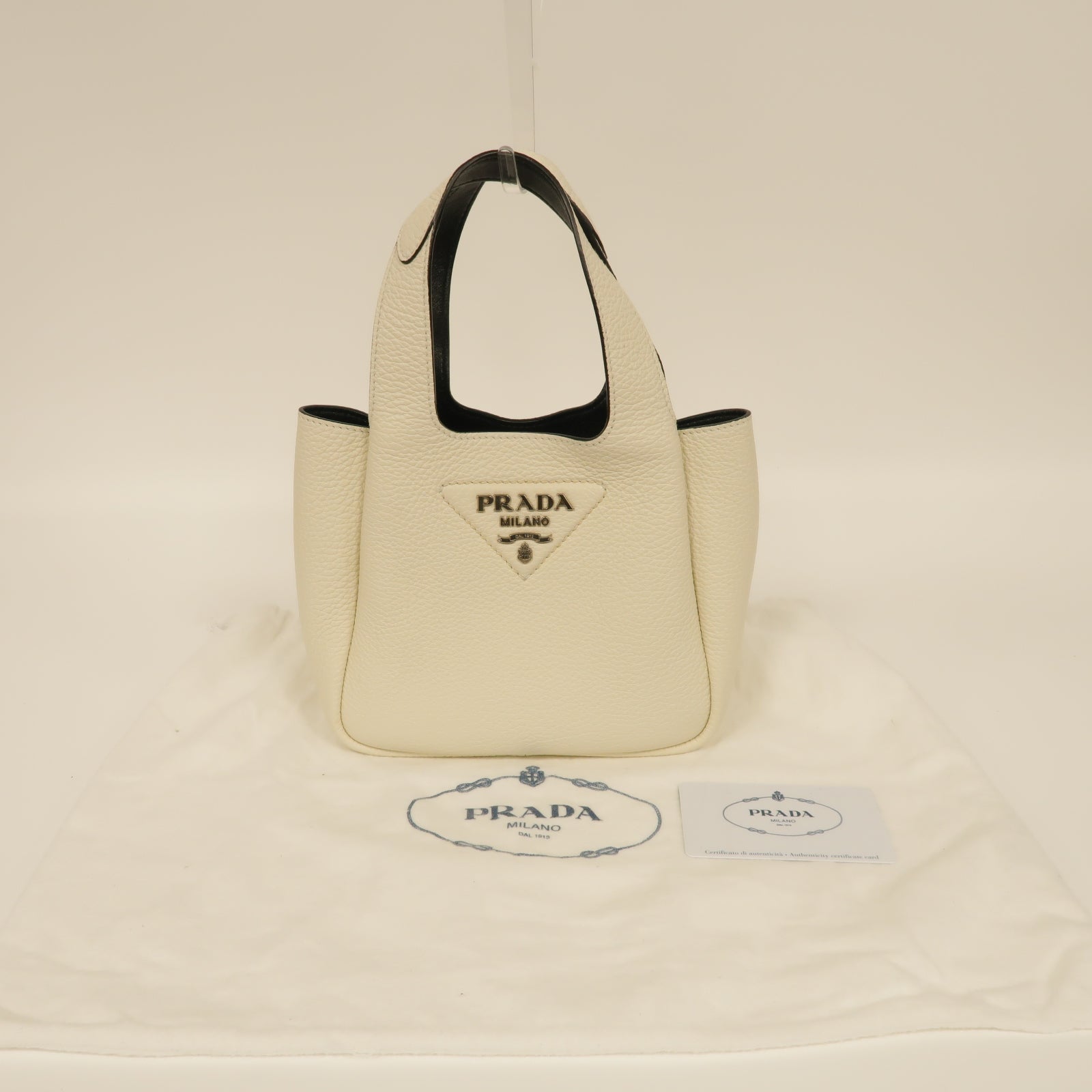 PRADA 牛皮皮革Handbag銀扣手挽袋白色