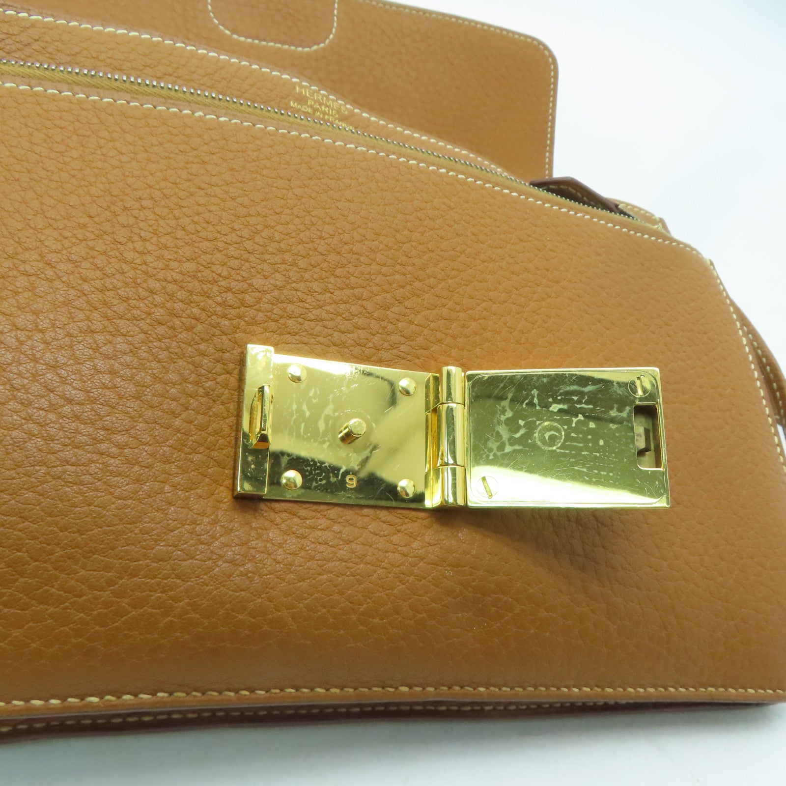 HERMES 【激減優惠】牛皮皮革Jet Pochette金扣手挽袋啡色