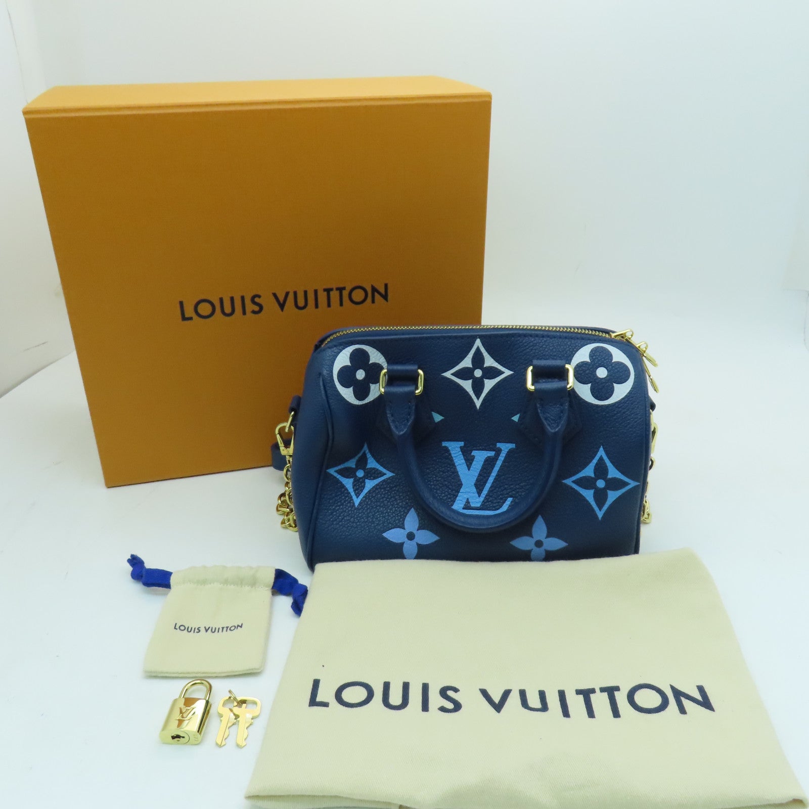 LOUIS VUITTON Monogram Empreinte Speedy Bandouliere 20 gold buckle handle shoulder bag blue
