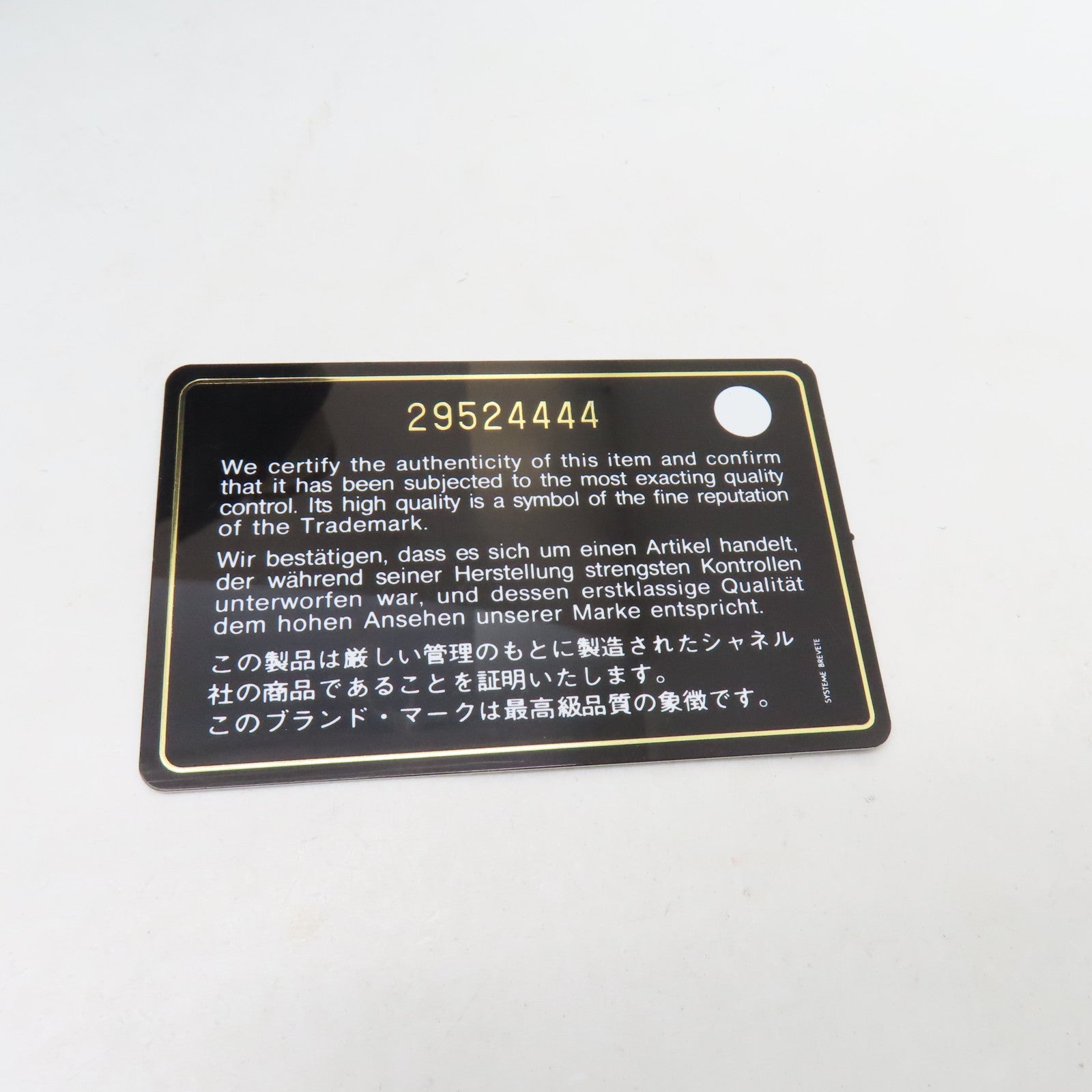 CHANEL 帆布Deauville PM金扣肩背袋米色