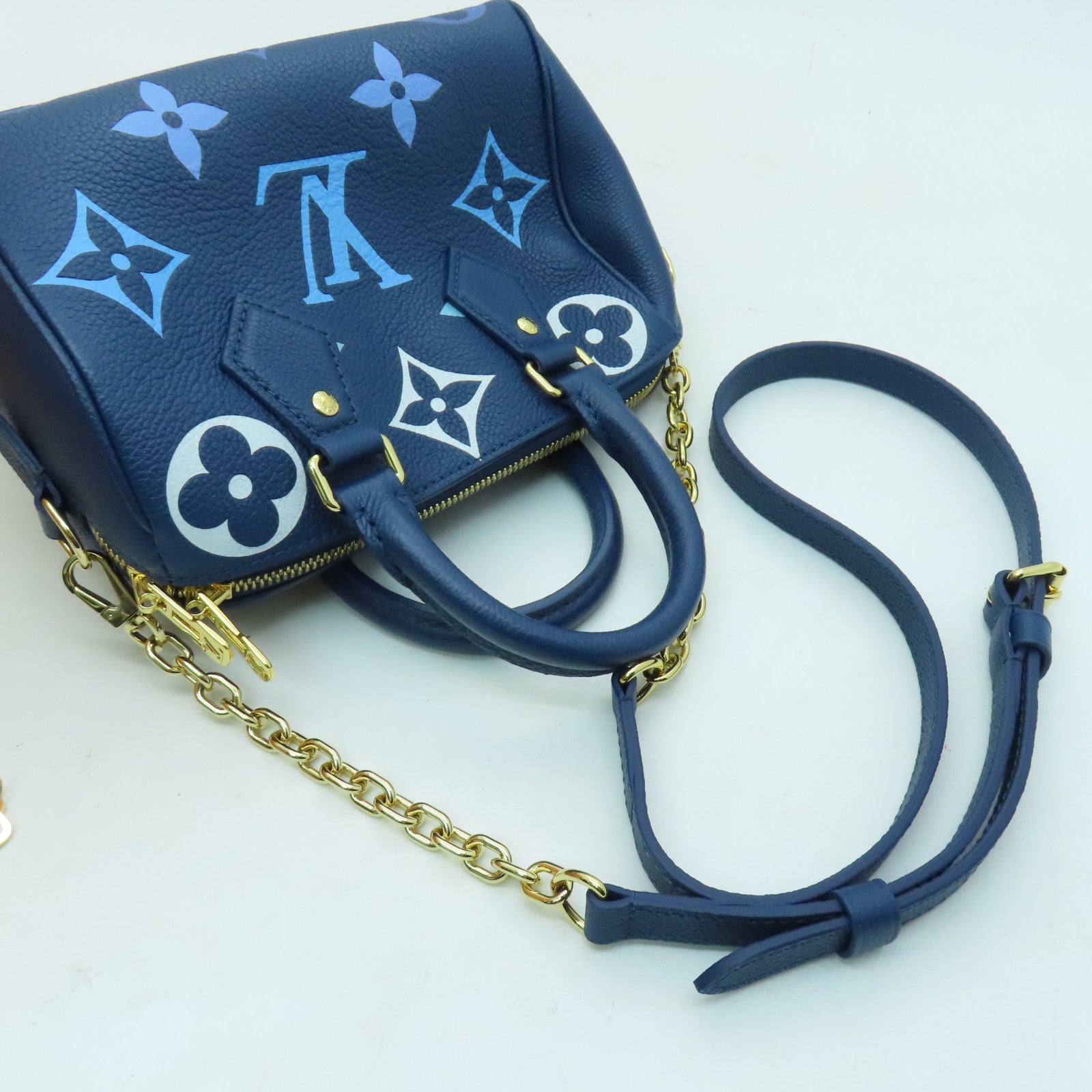 LOUIS VUITTON Monogram Empreinte Speedy Bandouliere 20 gold buckle handle shoulder bag blue