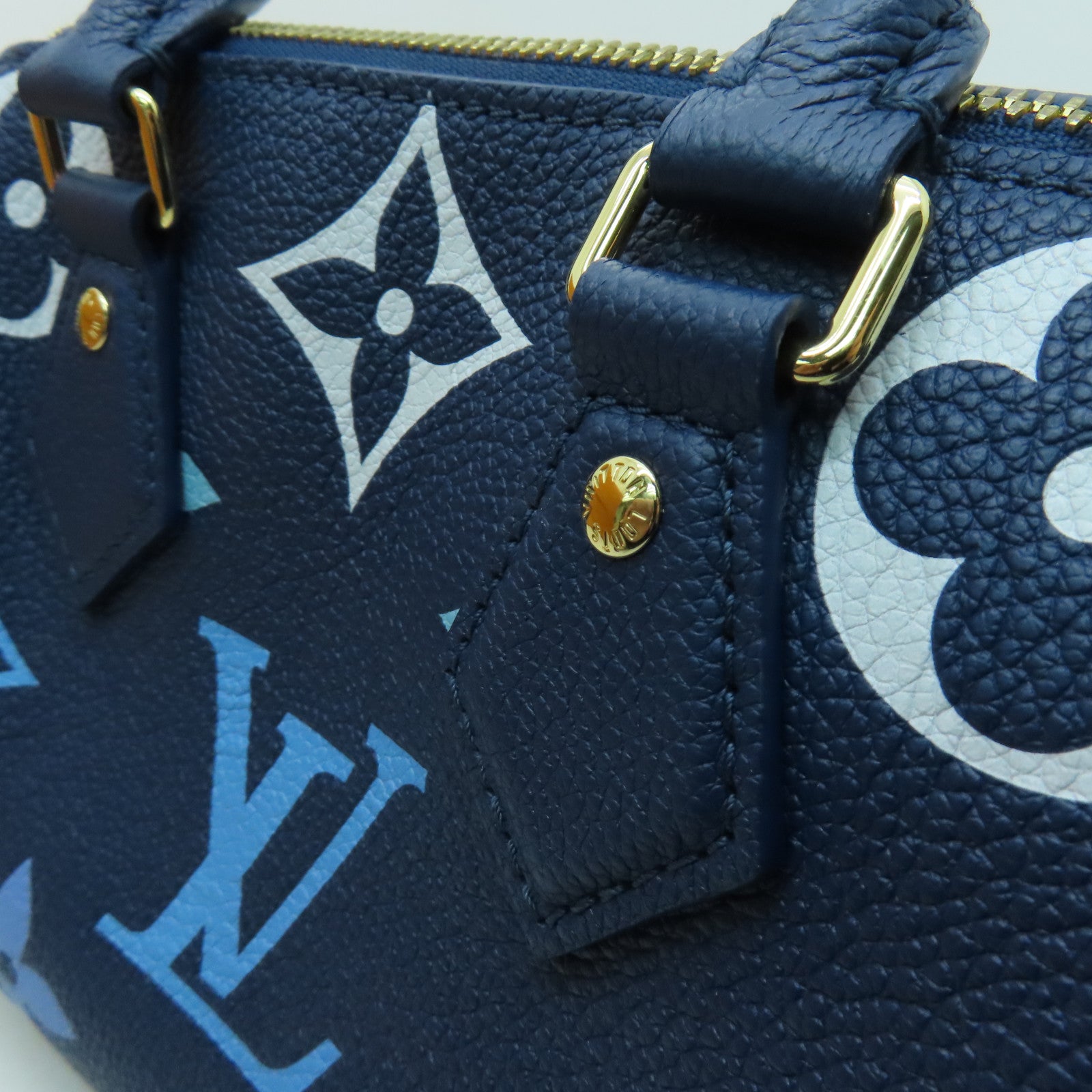 LOUIS VUITTON Monogram Empreinte Speedy Bandouliere 20 gold buckle handle shoulder bag blue