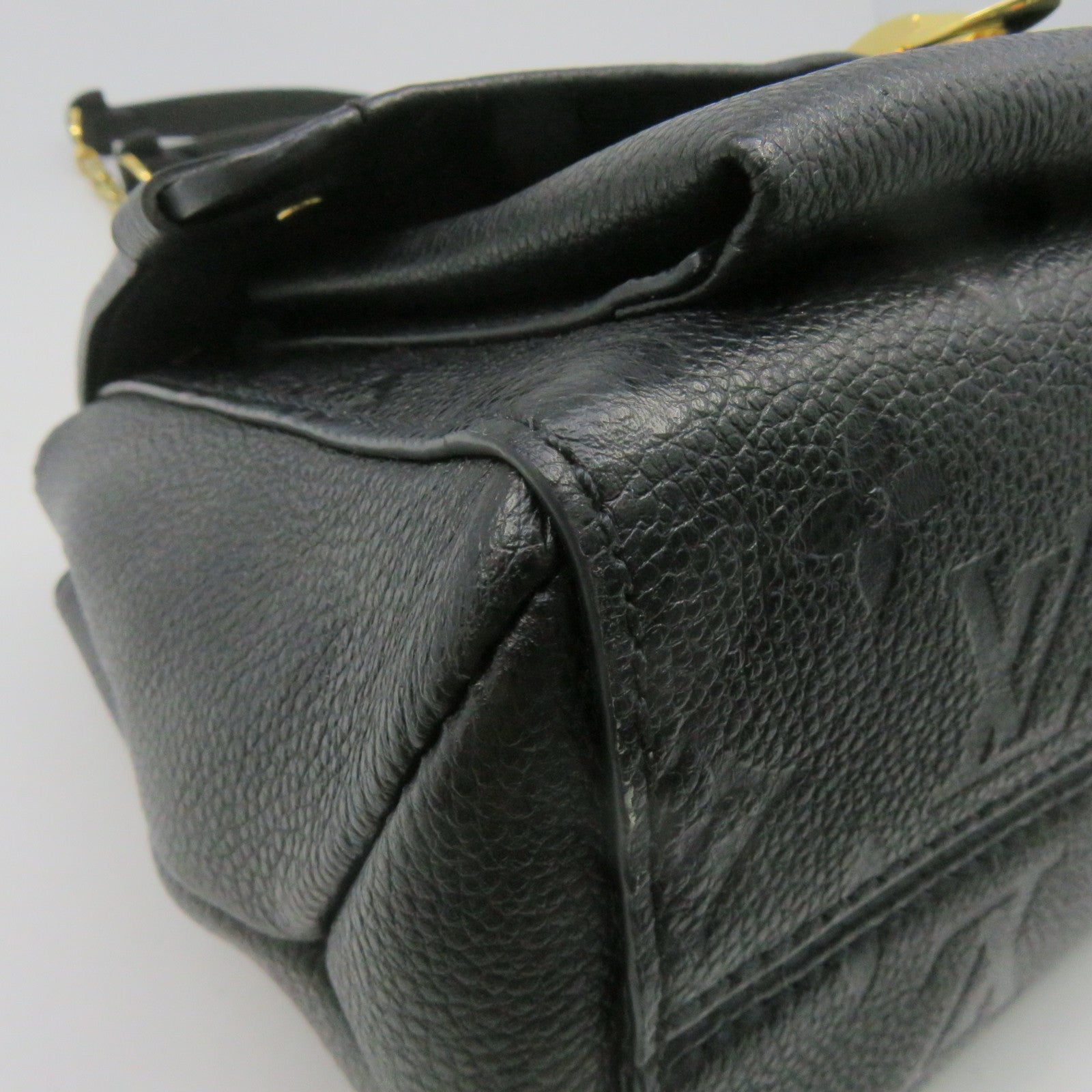 LOUIS VUITTON Monogram Empreinte Vavin PM gold buckle handle bag