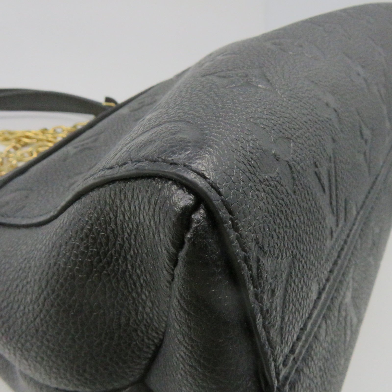 LOUIS VUITTON Monogram Empreinte Vavin PM gold buckle handle bag