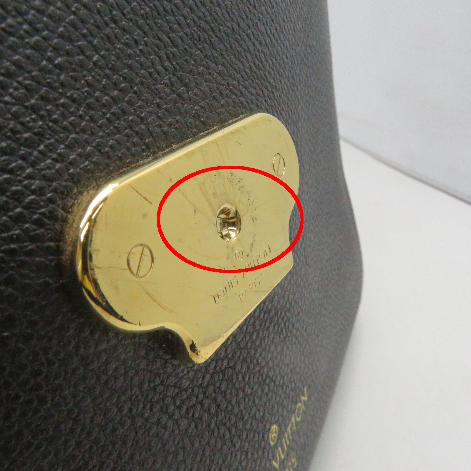 LOUIS VUITTON Monogram Empreinte Vavin PM gold buckle handle bag