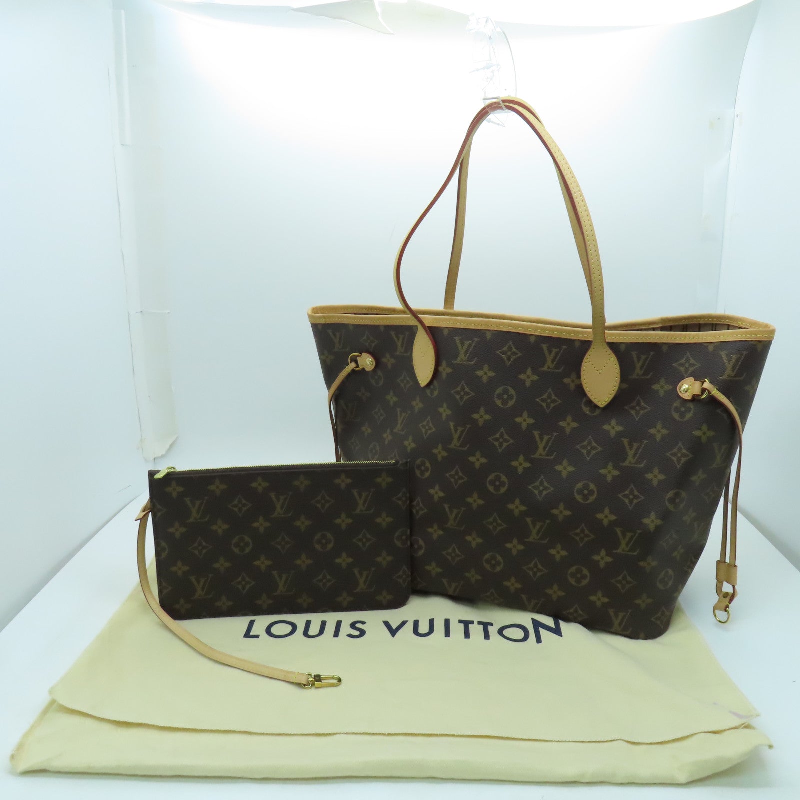 LOUIS VUITTON Monogram Neverfull MM gold buckle handle bag brown