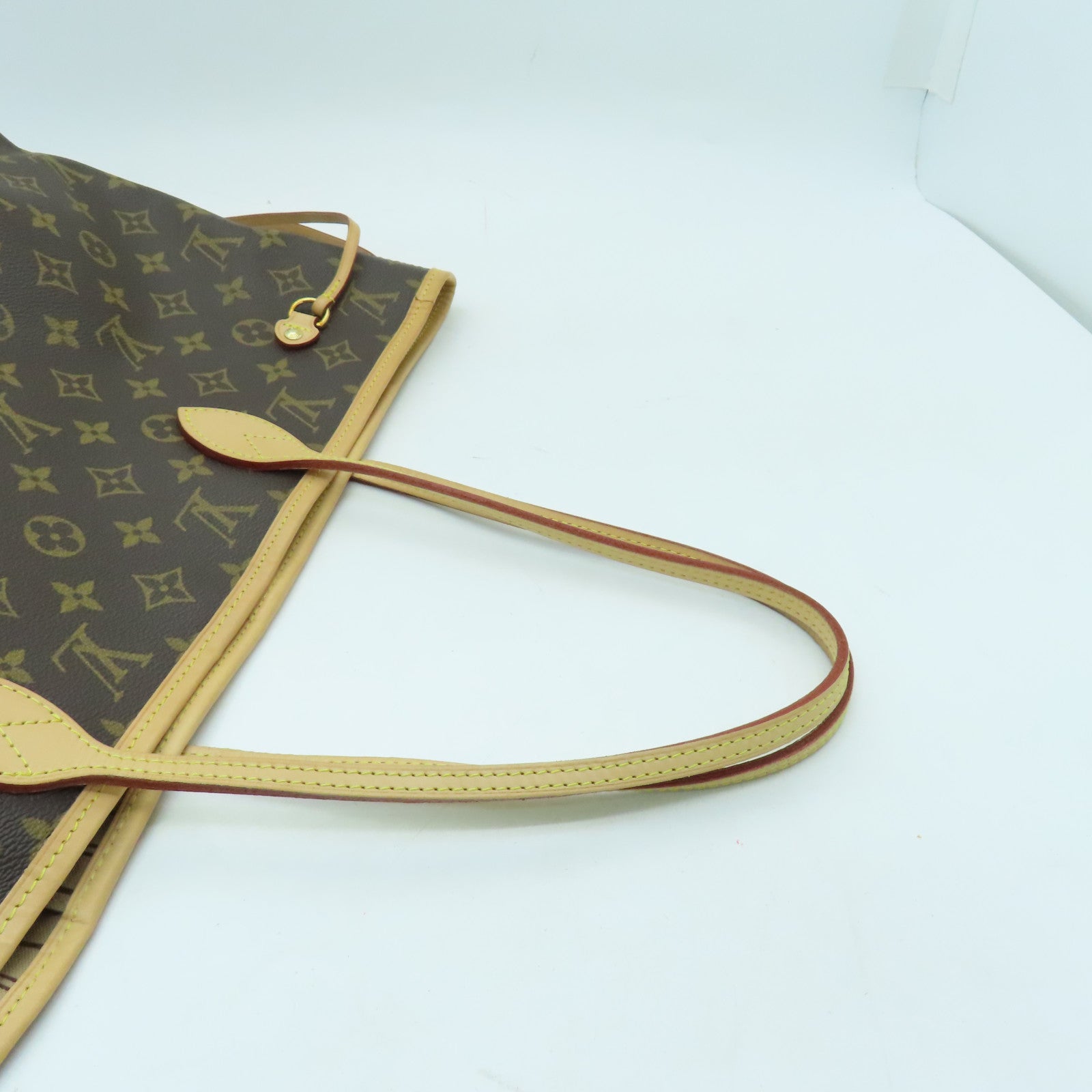 LOUIS VUITTON Monogram Neverfull MM gold buckle handle bag brown