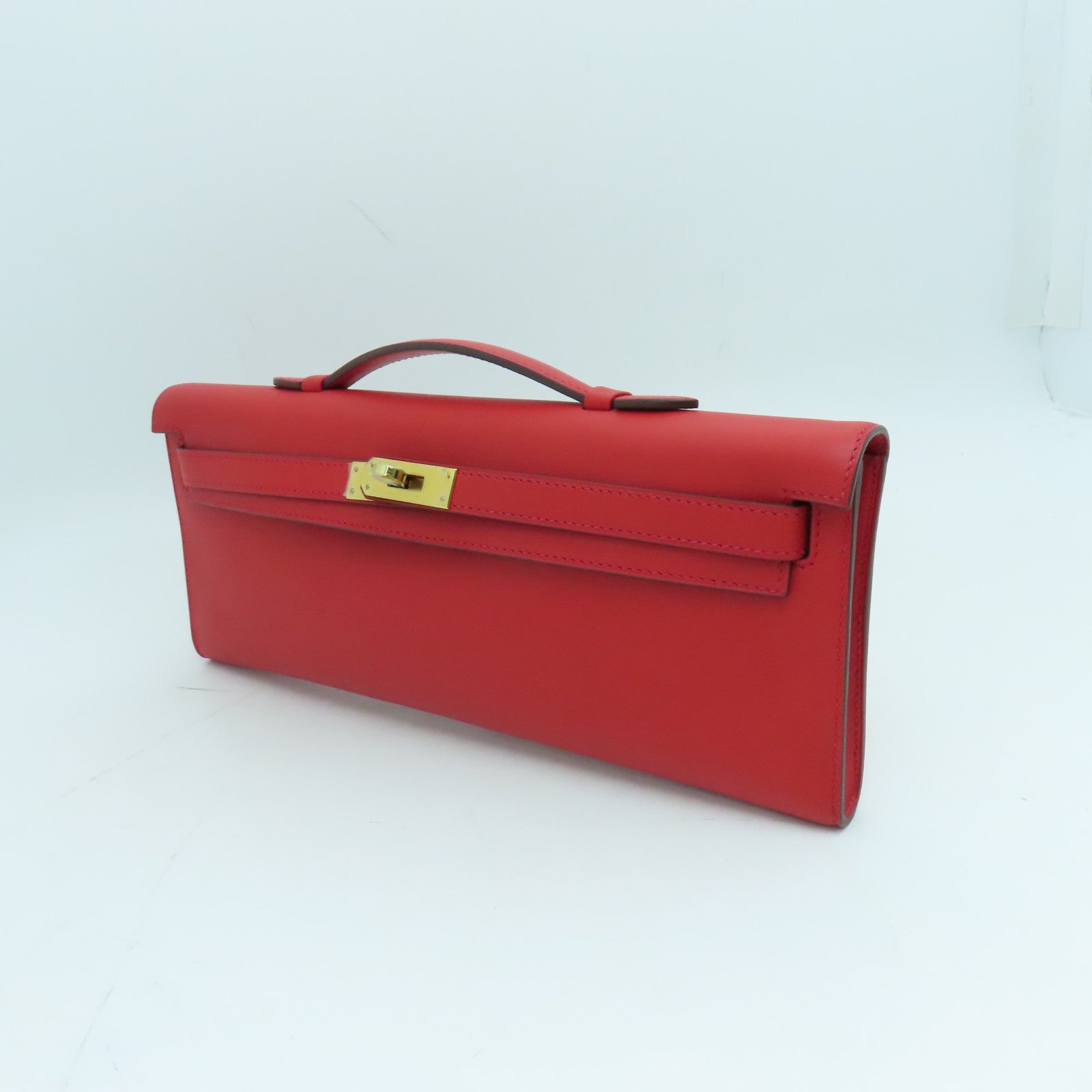 HERMES Swift皮革Kelly Cut金扣手挽袋红色