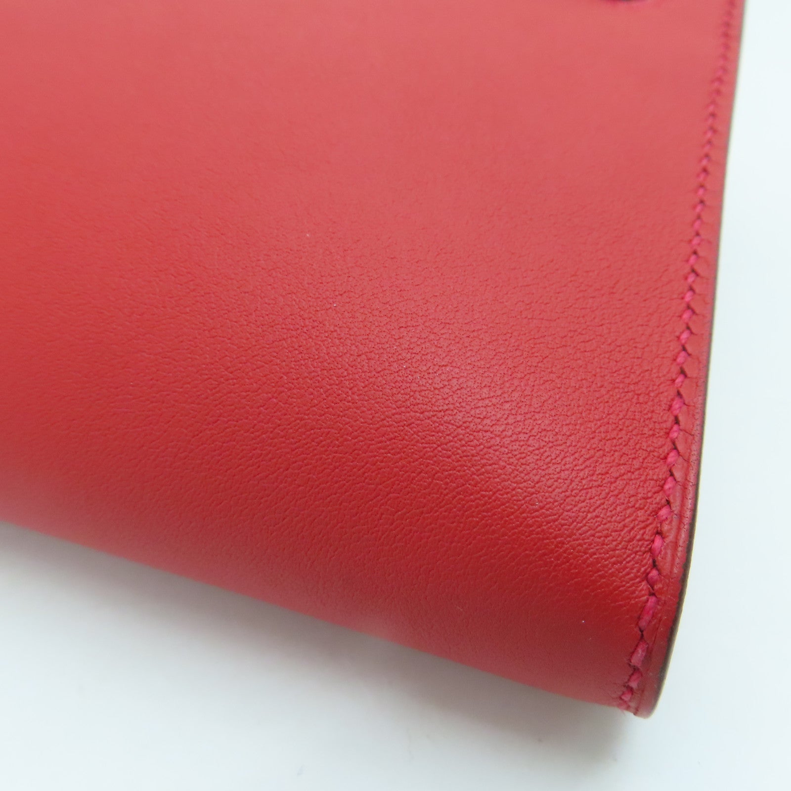 HERMES Swift皮革Kelly Cut金扣手挽袋红色