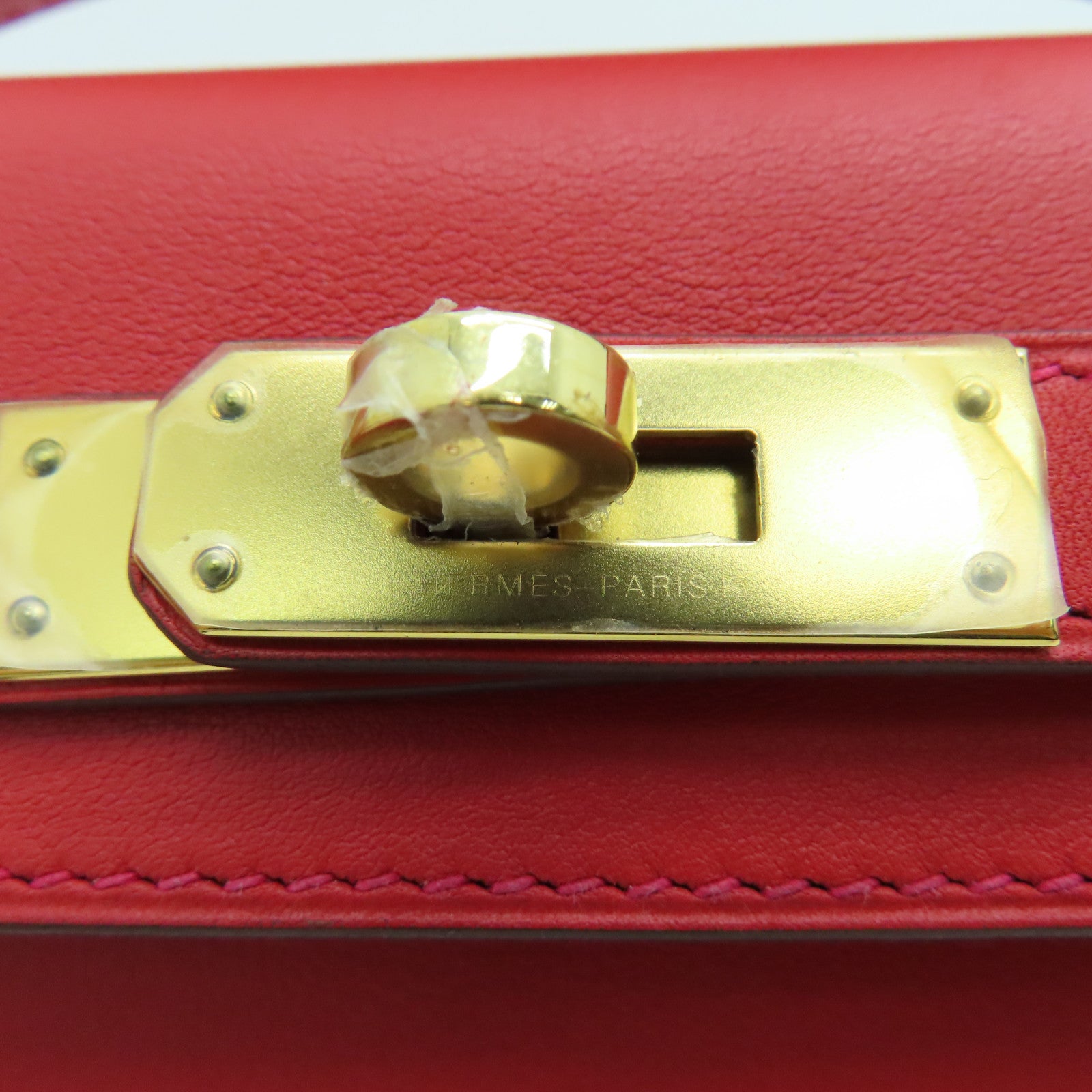 HERMES Swift皮革Kelly Cut金扣手挽袋红色