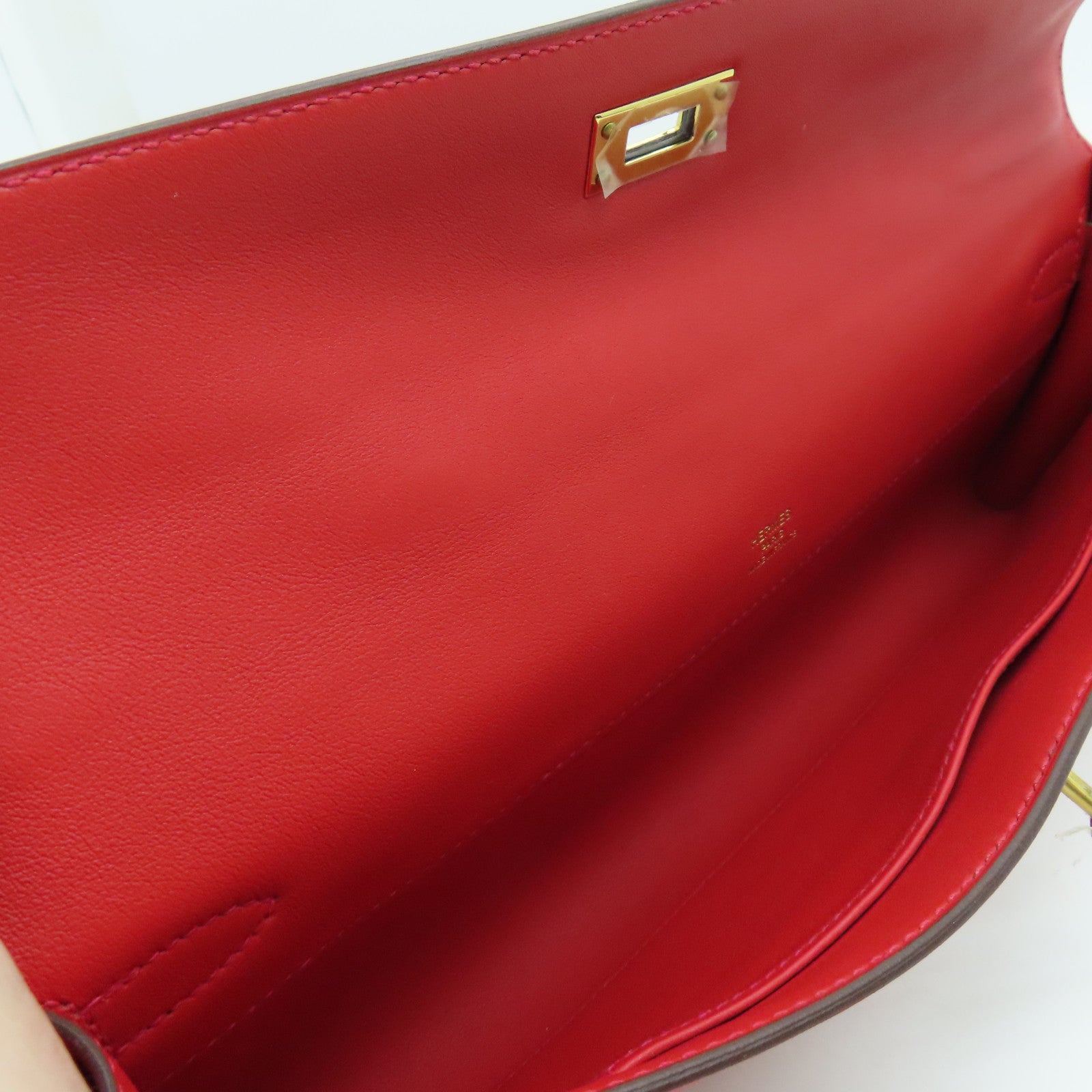 HERMES Swift皮革Kelly Cut金扣手挽袋红色