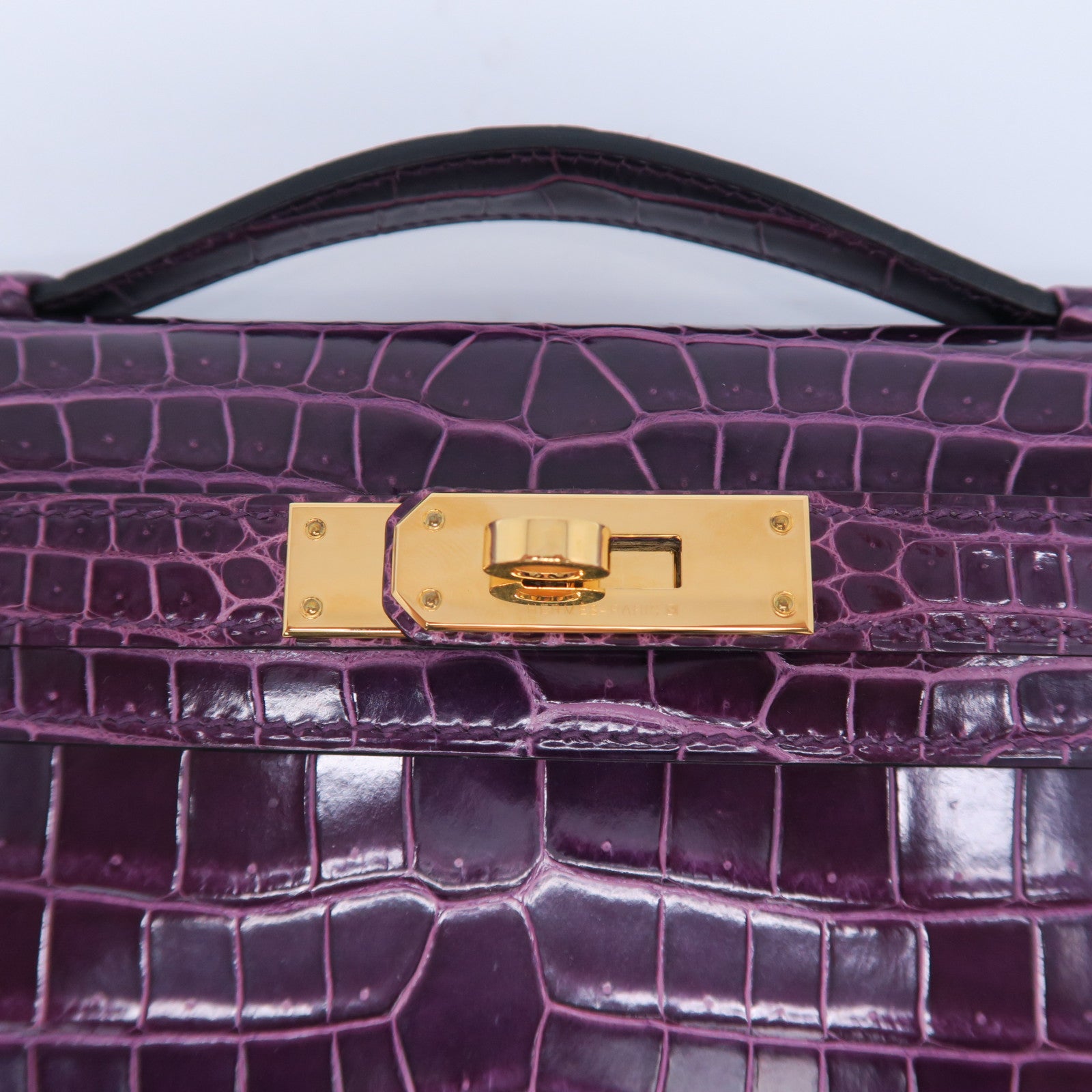HERMES Croco Porosus鳄鱼皮革Kelly Cut金扣手拿包紫水晶色