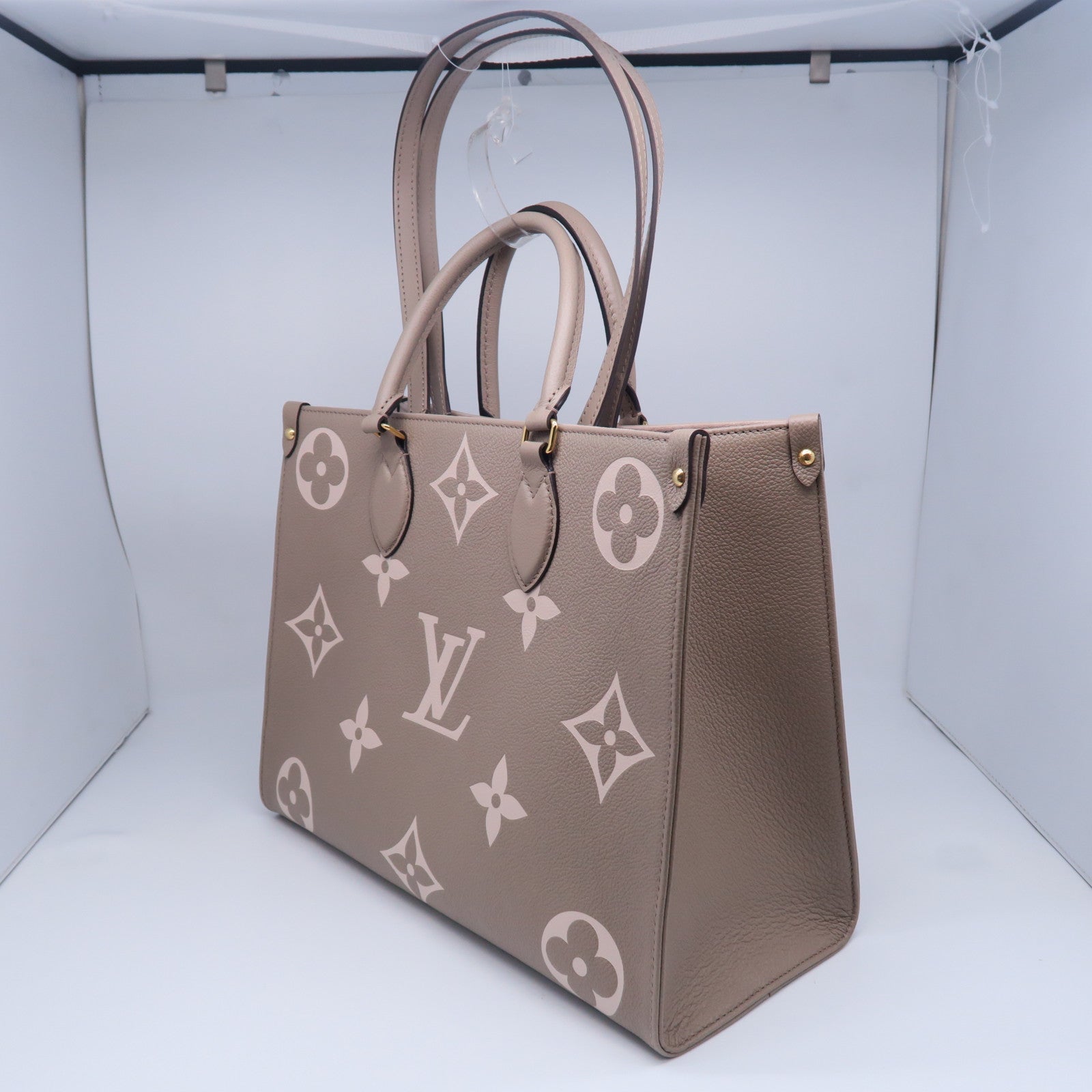 LOUIS VUITTON Monogram Empreinte Onthego MM金扣手挽肩背兩用袋灰色米色