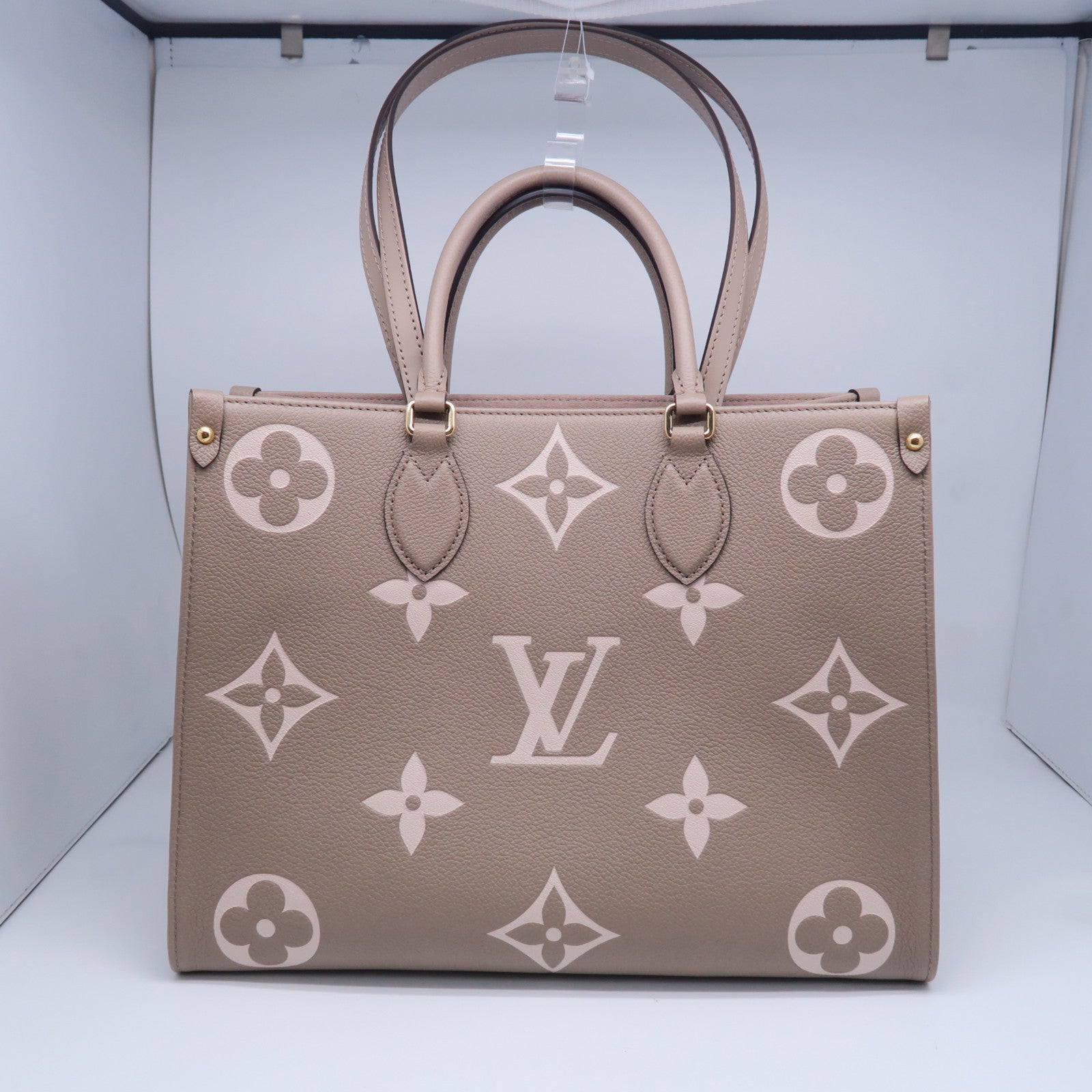 LOUIS VUITTON Monogram Empreinte Onthego MM金扣手挽肩背兩用袋灰色米色