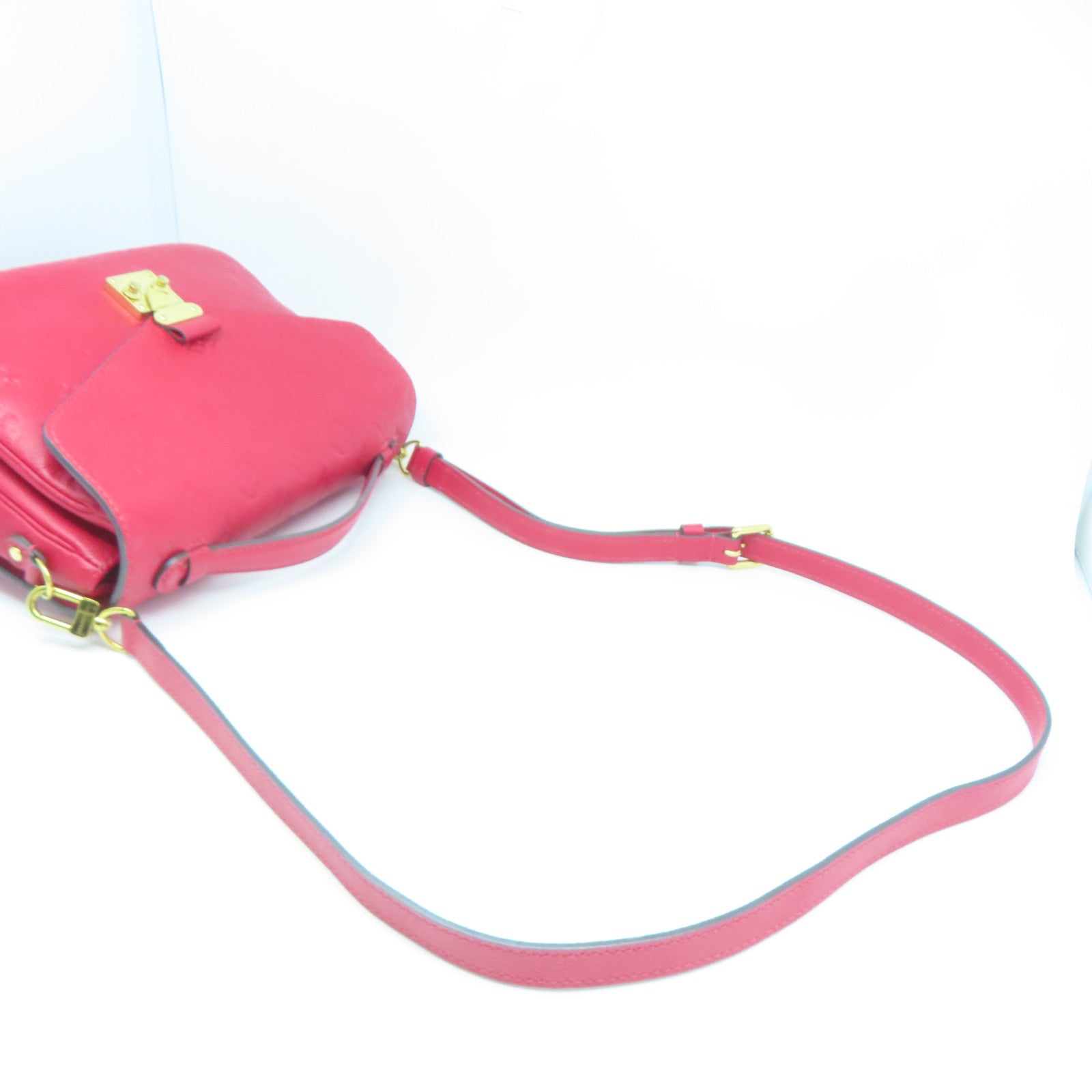 LOUIS VUITTON Monogram Empreinte Pochette Metis金扣手挽肩背兩用袋紅色