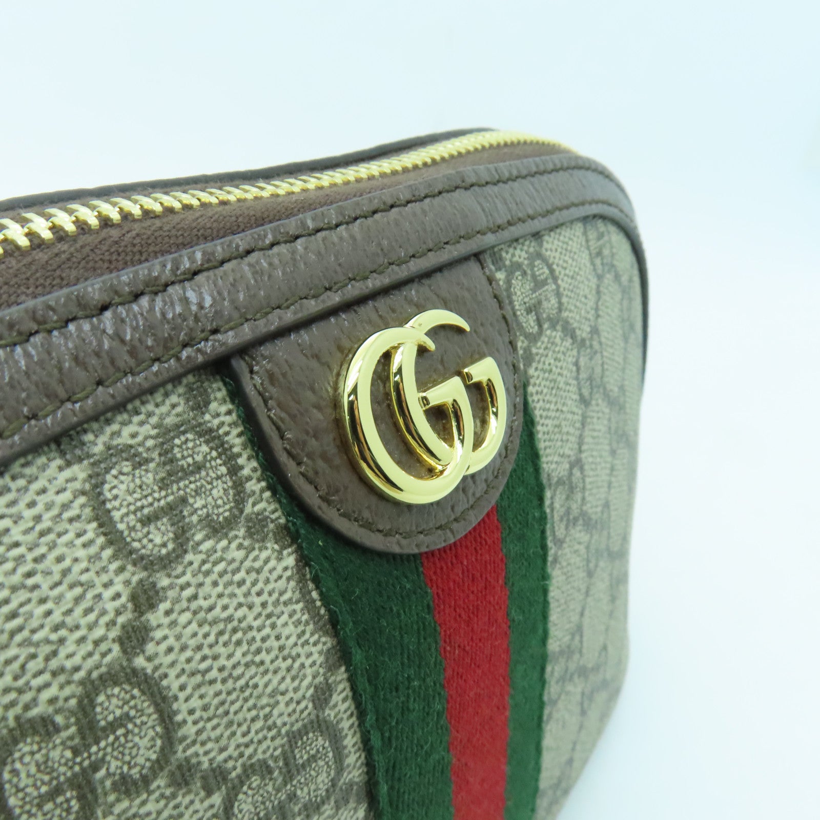 GUCCI 塗層帆布Ophidia GG金扣手拿包啡色