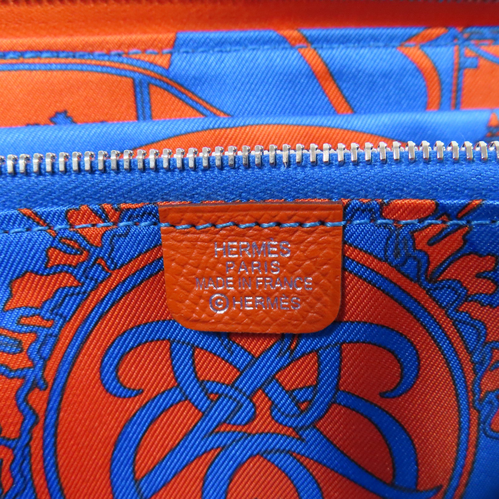 HERMES Epsom皮革Silk In Long Wallet銀扣長錢包橙色