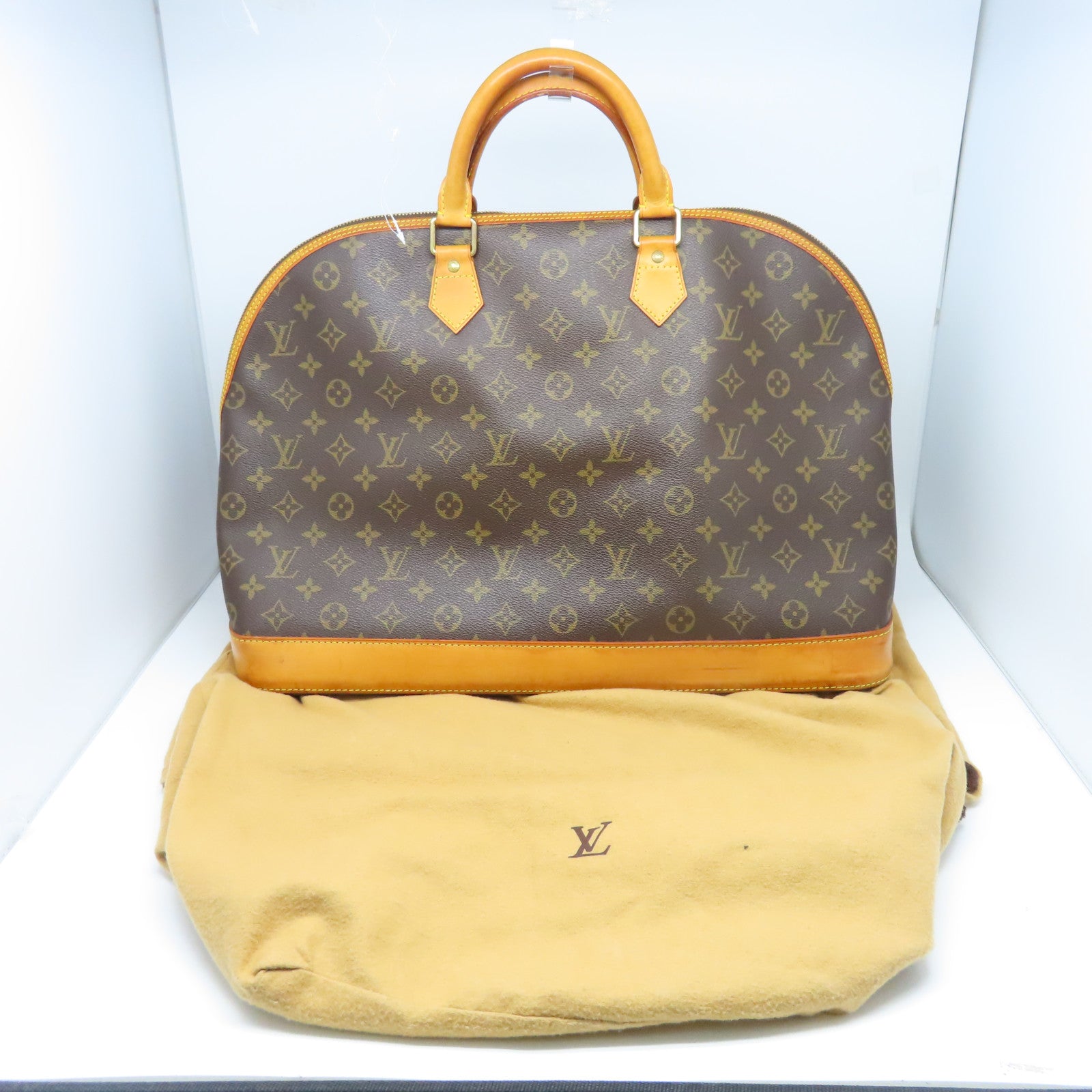 LOUIS VUITTON Monogram Alma Voyage MM金扣手挽袋棕色
