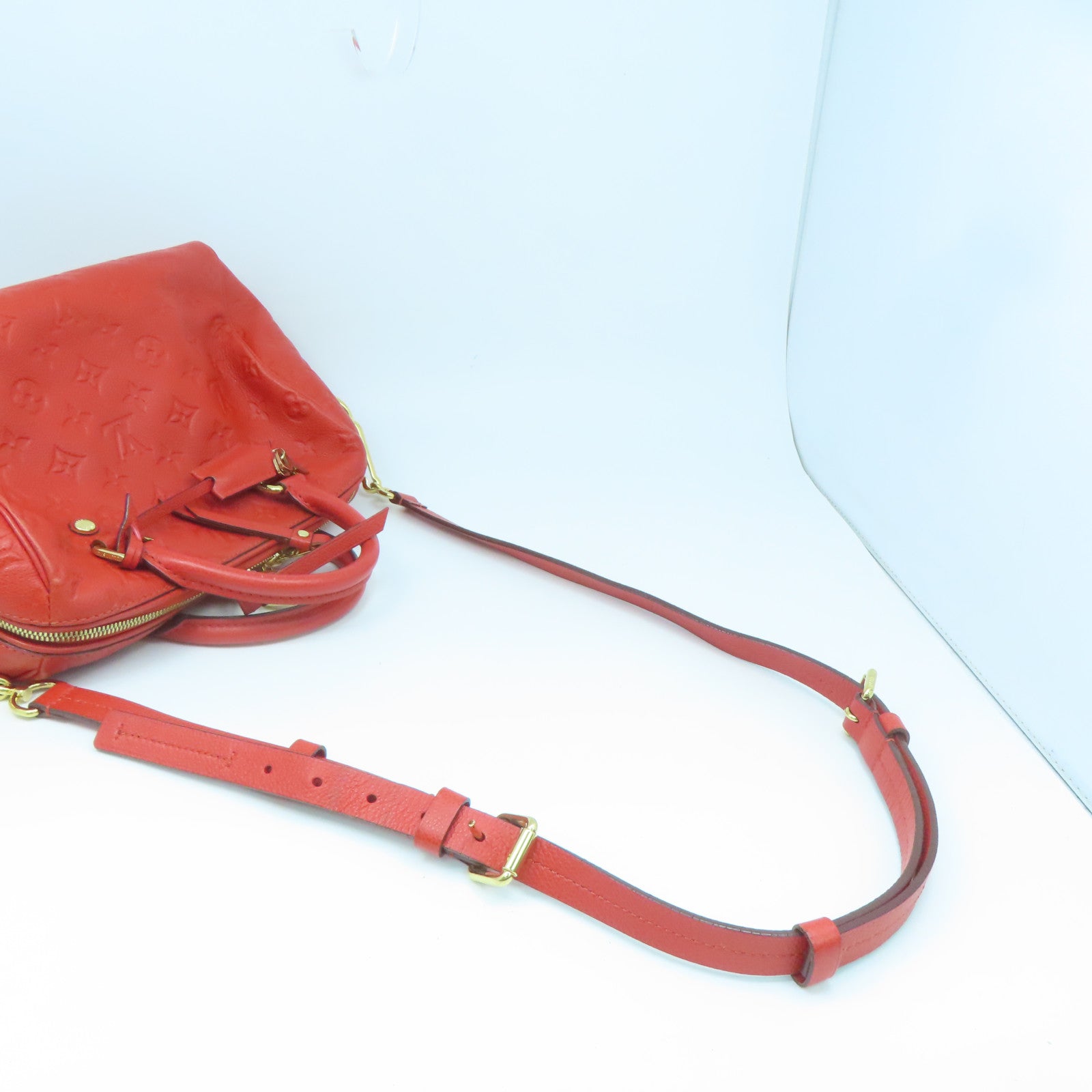 LOUIS VUITTON 【激減優惠】Monogram Empreinte Speedy 25 Bandouliere金扣手挽肩背兩用袋橙色