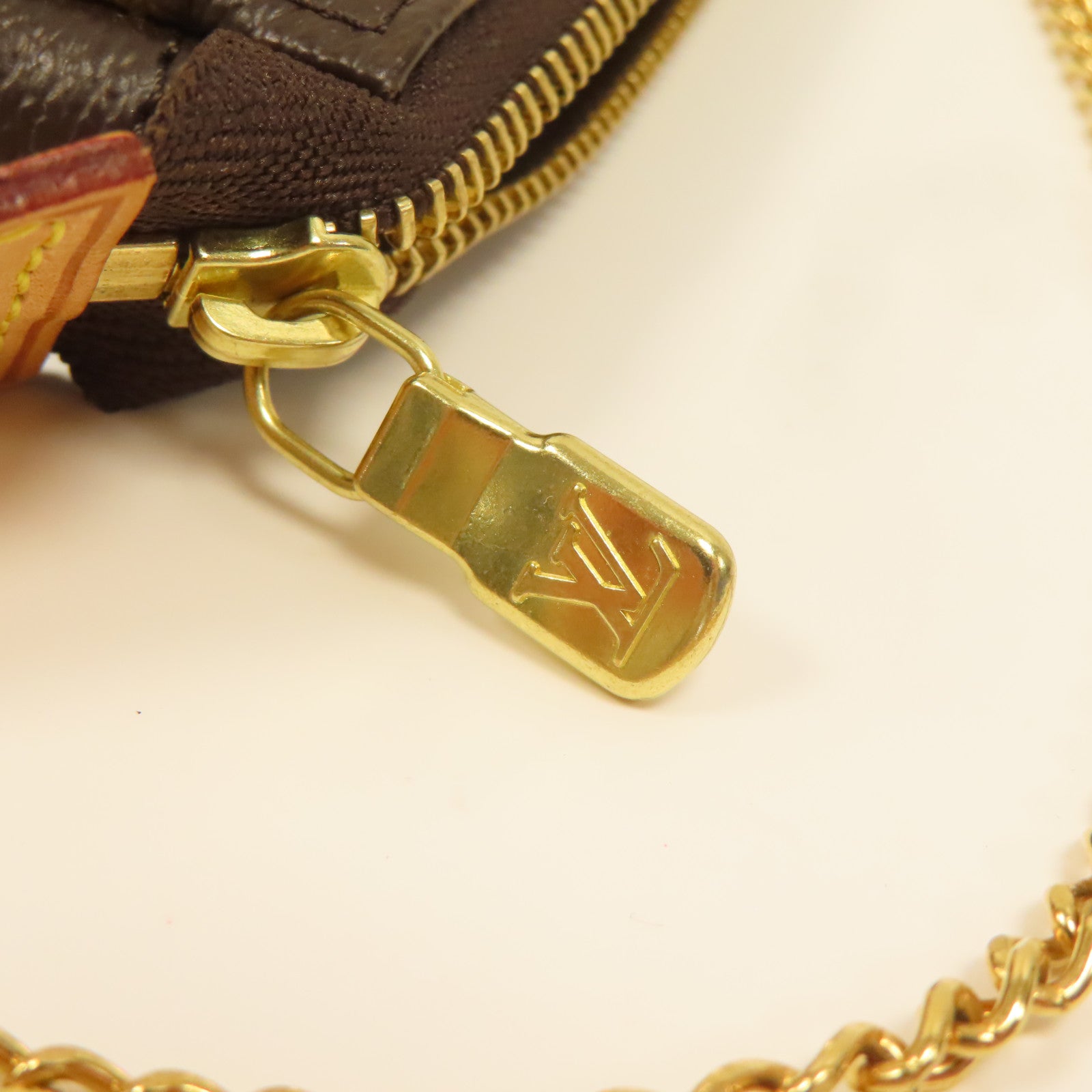 LOUIS VUITTON Monogram Mini Pouchette Accessoires金扣手挽袋啡色
