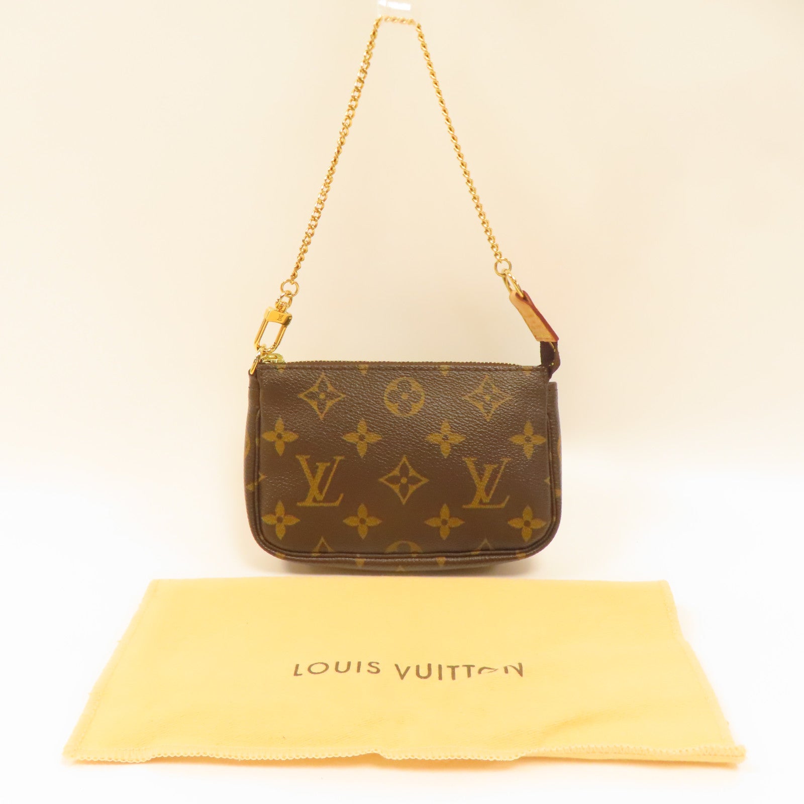 LOUIS VUITTON Monogram Mini Pouchette Accessoires金扣手挽袋啡色