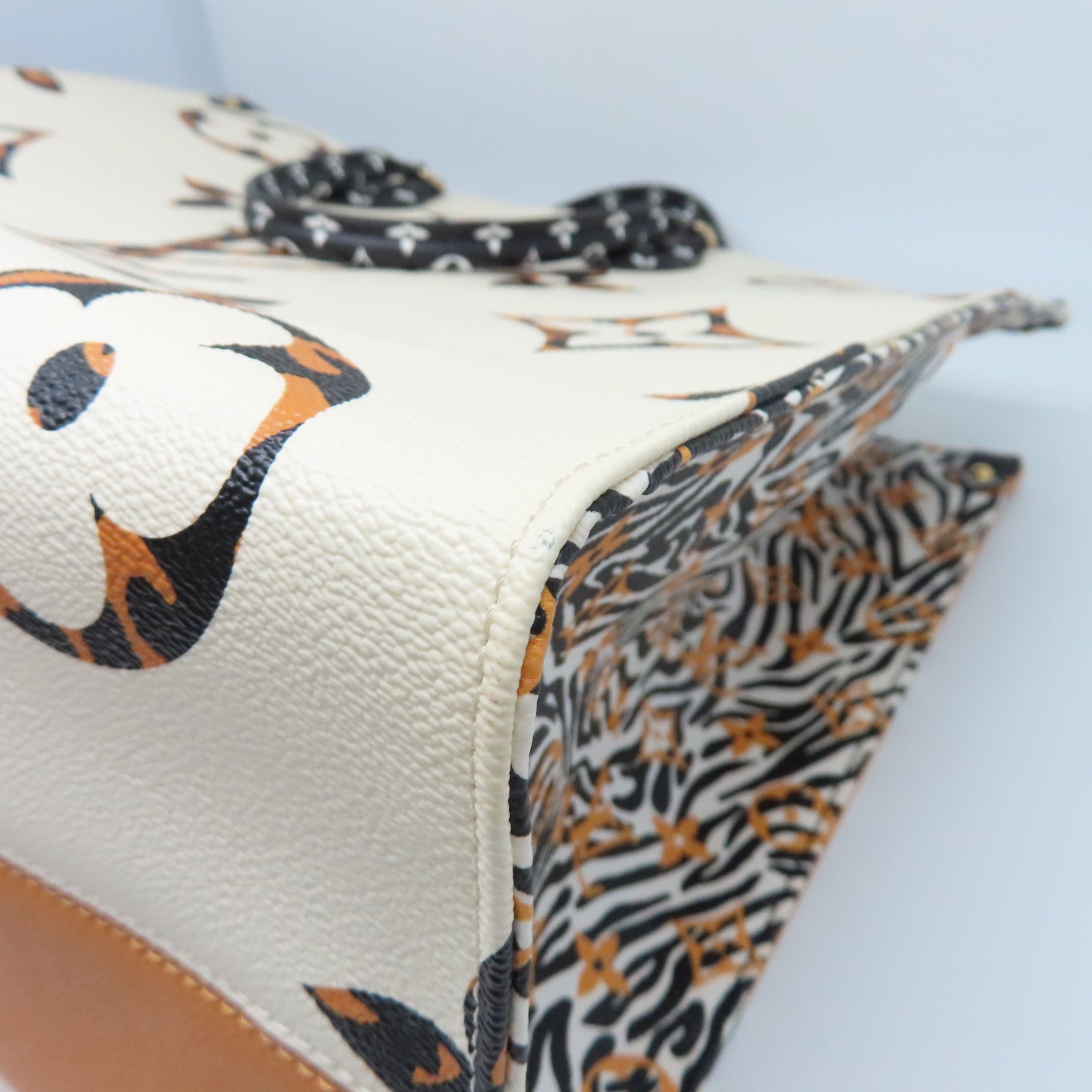 LOUIS VUITTON Monogram Jungle Onthego GM金扣手挽袋白色/棕色
