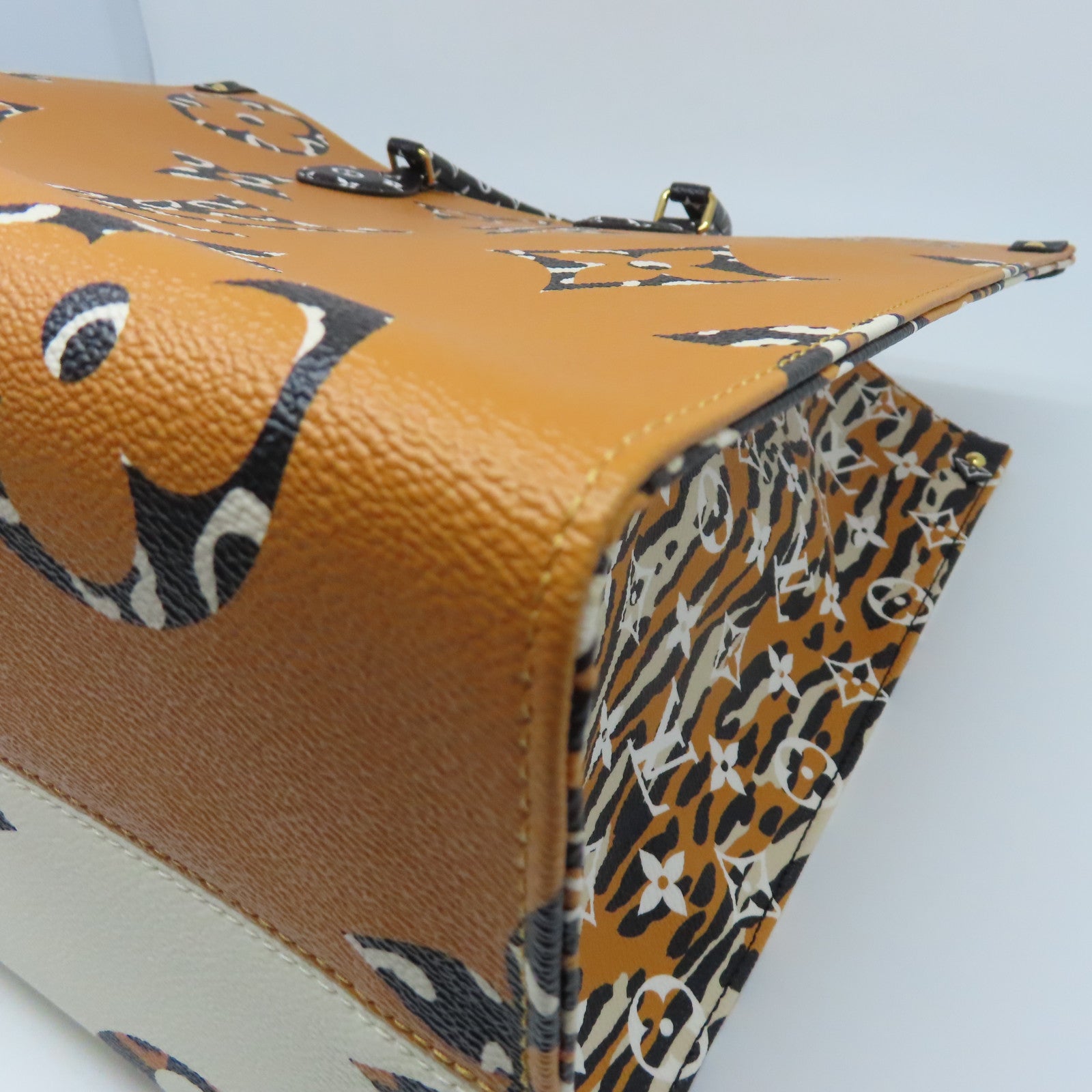 LOUIS VUITTON Monogram Jungle Onthego GM金扣手挽袋白色/棕色