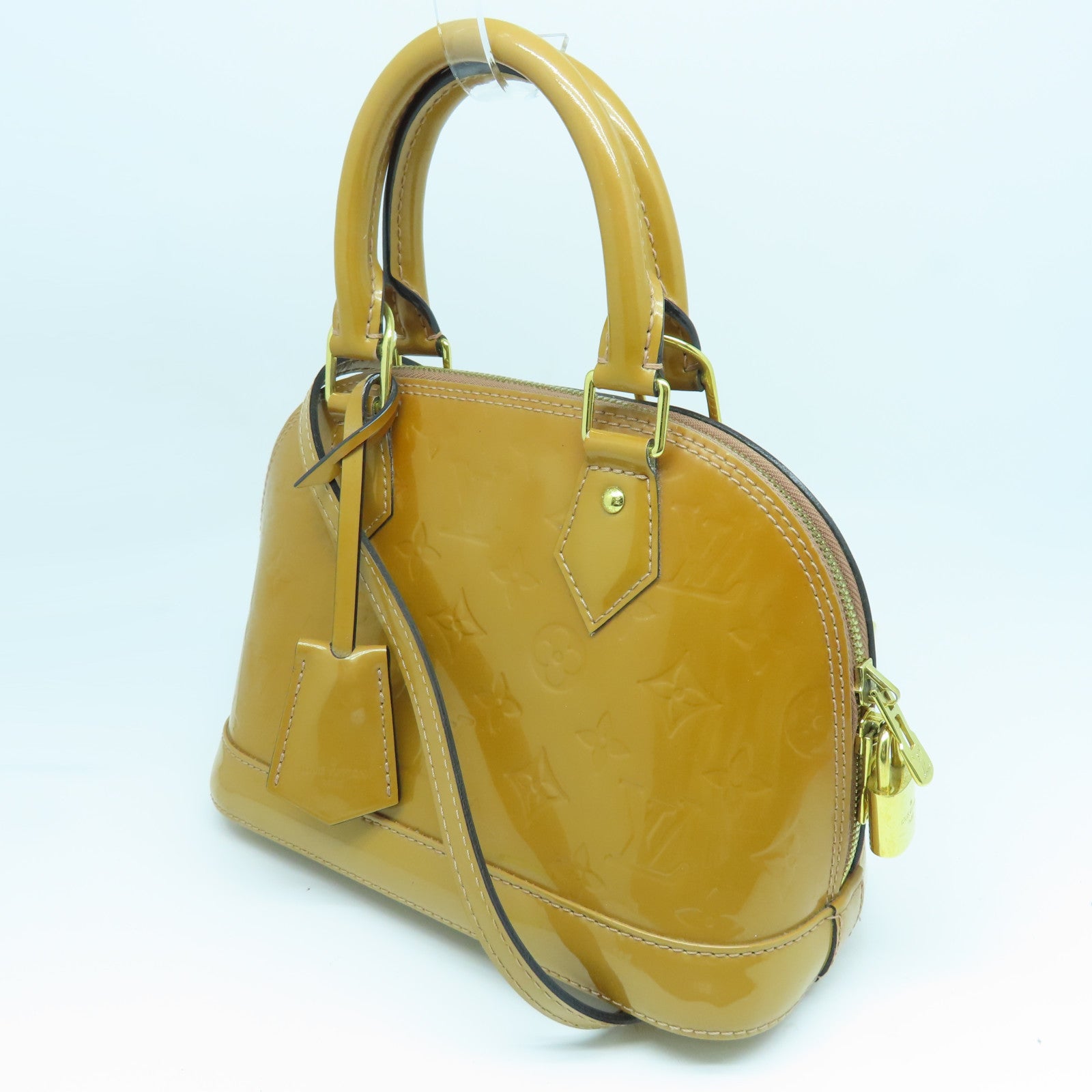 LOUIS VUITTON Monogram Vernis Alma BB gold buckle handle shoulder bag brown