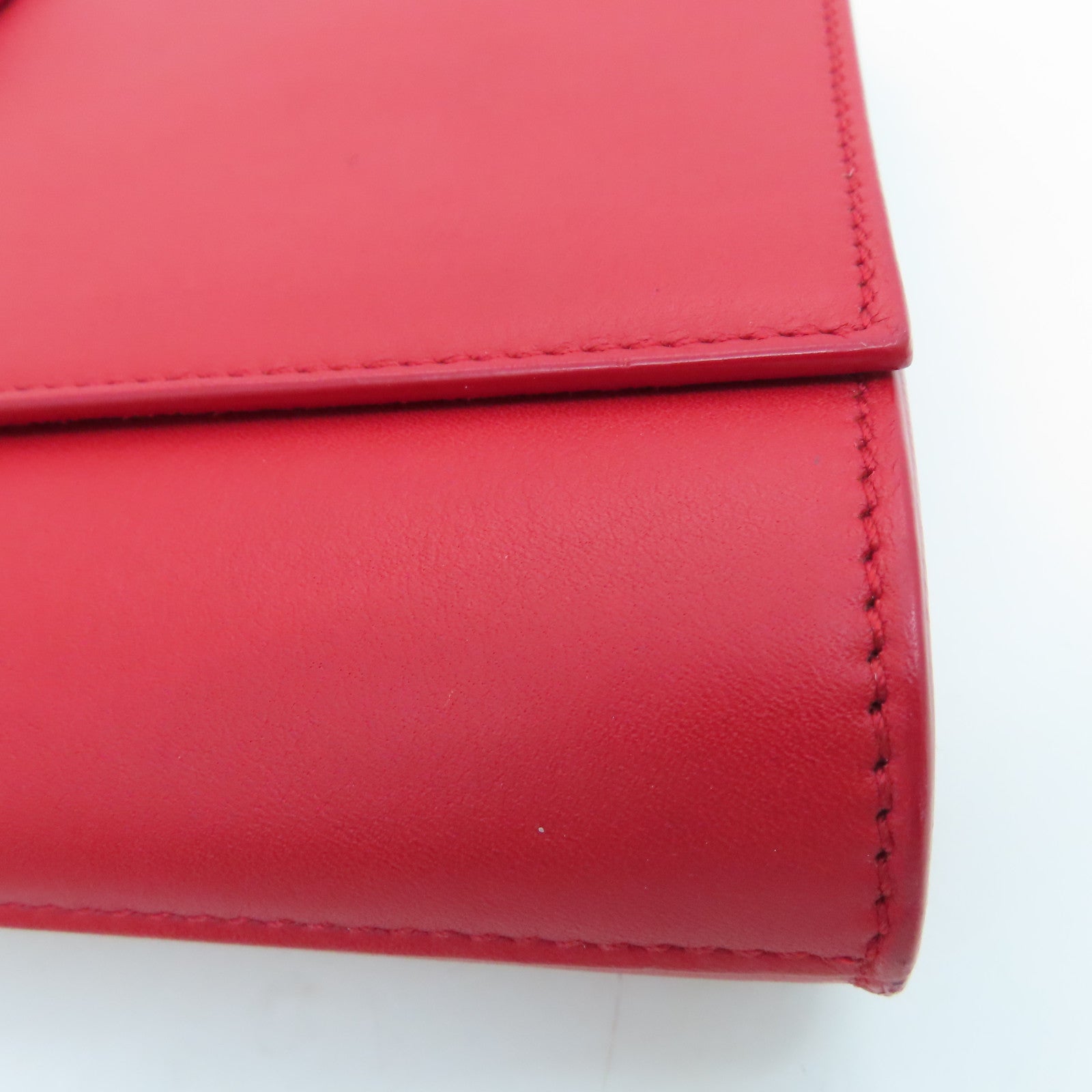 YVES SAINT LAURENT 牛皮皮革Clutch金扣手拿包红色