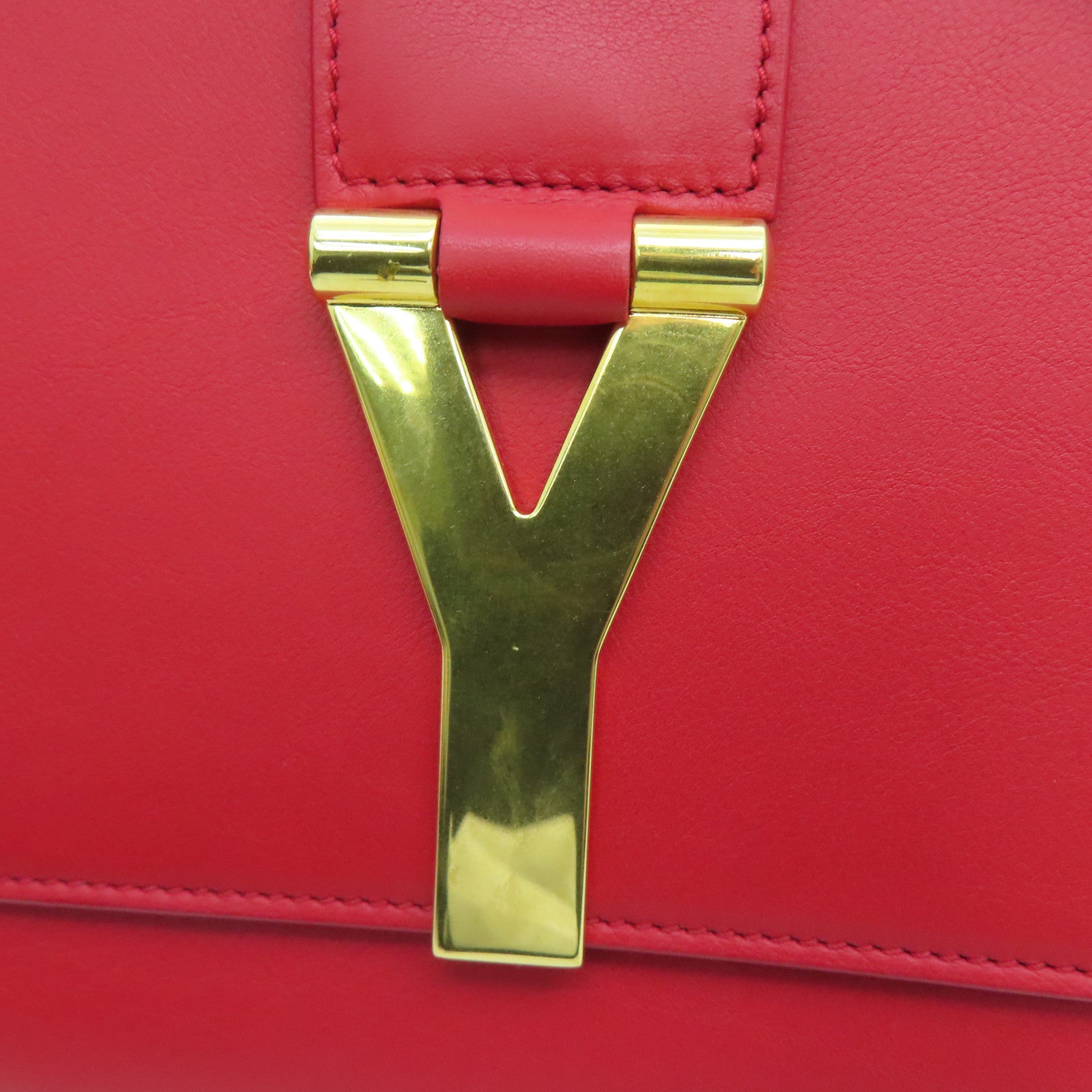 YVES SAINT LAURENT 牛皮皮革Clutch金扣手拿包红色