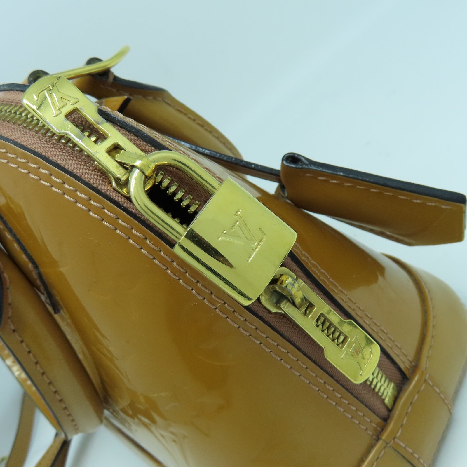 LOUIS VUITTON Monogram Vernis Alma BB gold buckle handle shoulder bag brown