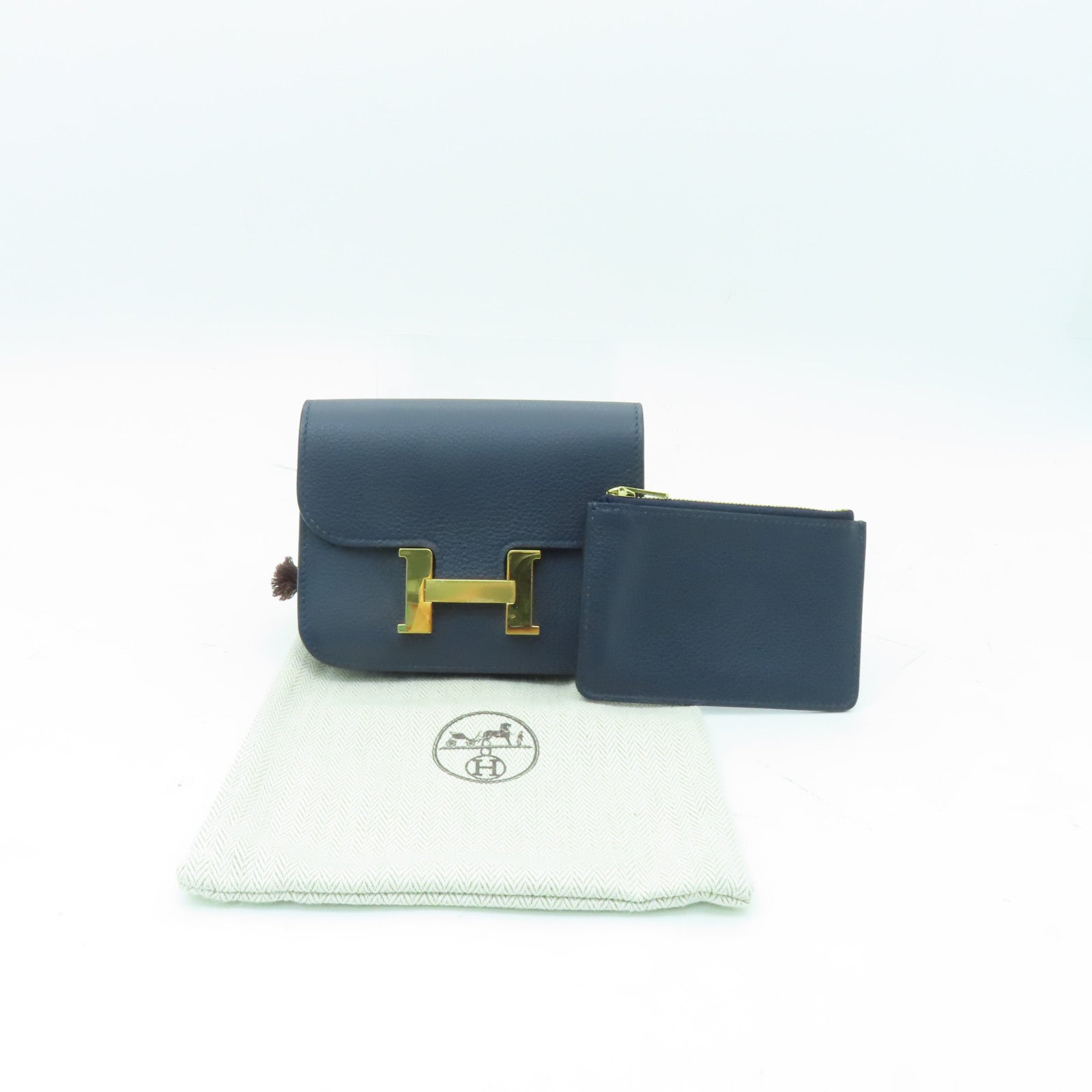 HERMES Evercolor皮革Constance Slim金扣手拿包Bleu Nuit深藍色