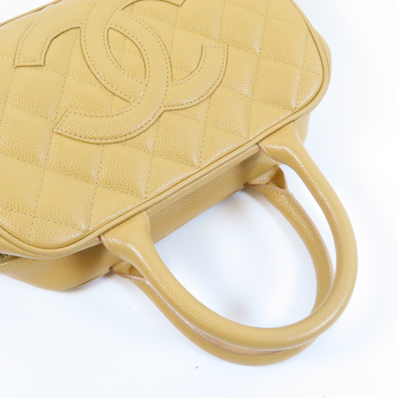 CHANEL 菱格Caviar皮革Vintage Bowling Bag金扣手挽袋米色