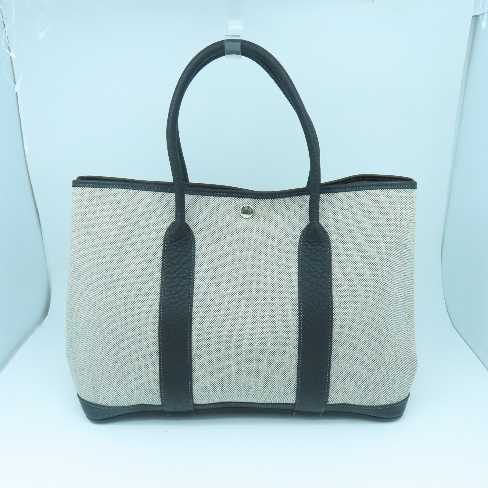 HERMES 帆布Garden Party PM银扣手挽袋白色/黑色